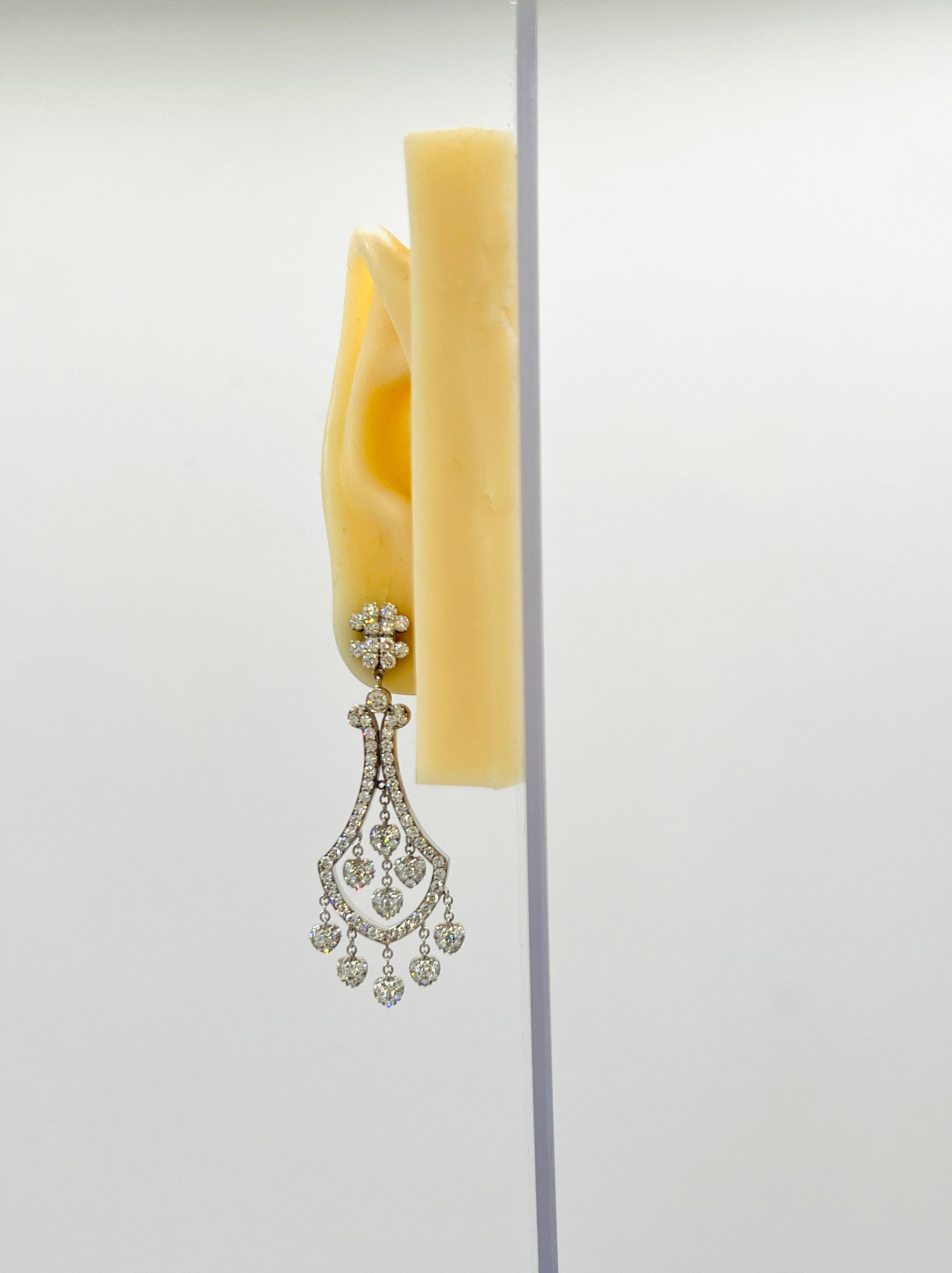 Beautiful white diamond dangle earrings with 214 stones weighing 5.00 ct.  Handmade in 18k white gold.