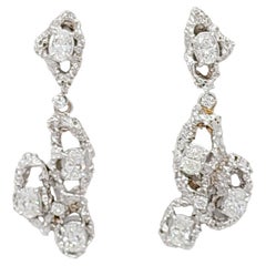 Orecchini pendenti con diamante bianco in oro bianco 18 carati