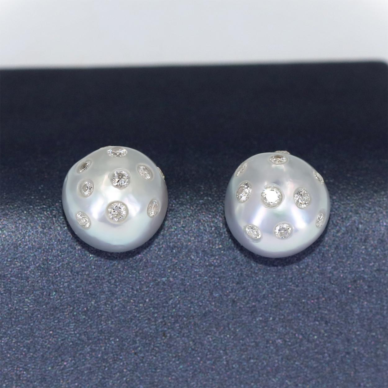 Round Silver Freshwater Pearl 9mm Stud Earrings hand-fabricated by jewelry artist Russell Trusso featuring he 0.34 total carats of signature embedded round brilliant-cut white diamonds and finished with 18k yellow gold settings, post, and jumbo