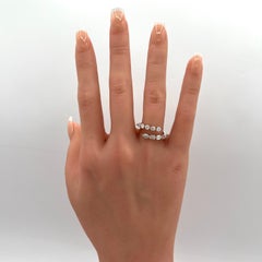 White Diamond Emerald and Round Bypass Ring in 18K White Gold