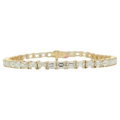 White Diamond Emerald Cut East West Tennis Bracelet  in  14K Yellow Gold