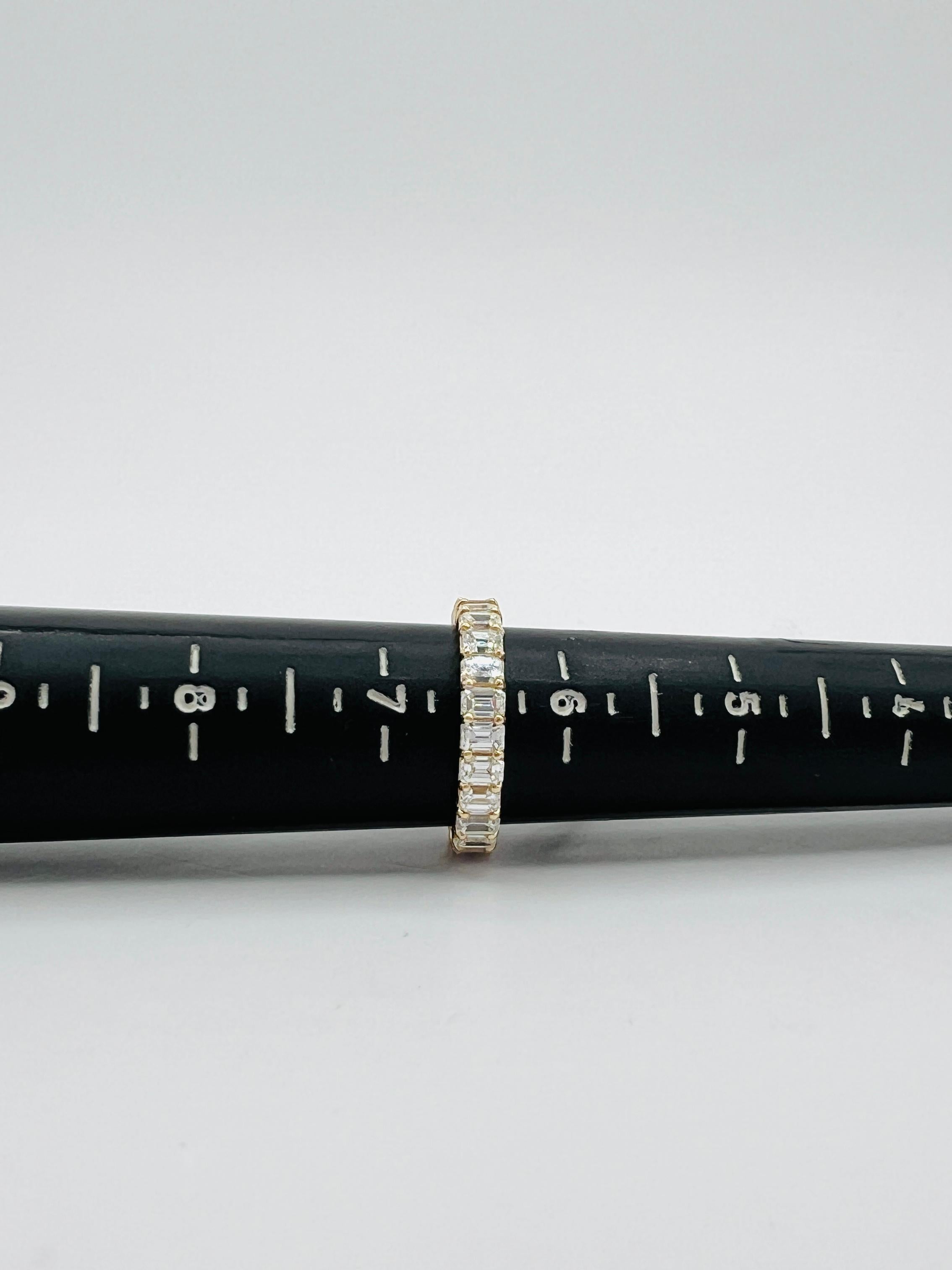 White Diamond Emerald Cut Eternity Band Ring in 14K Yellow Gold 5