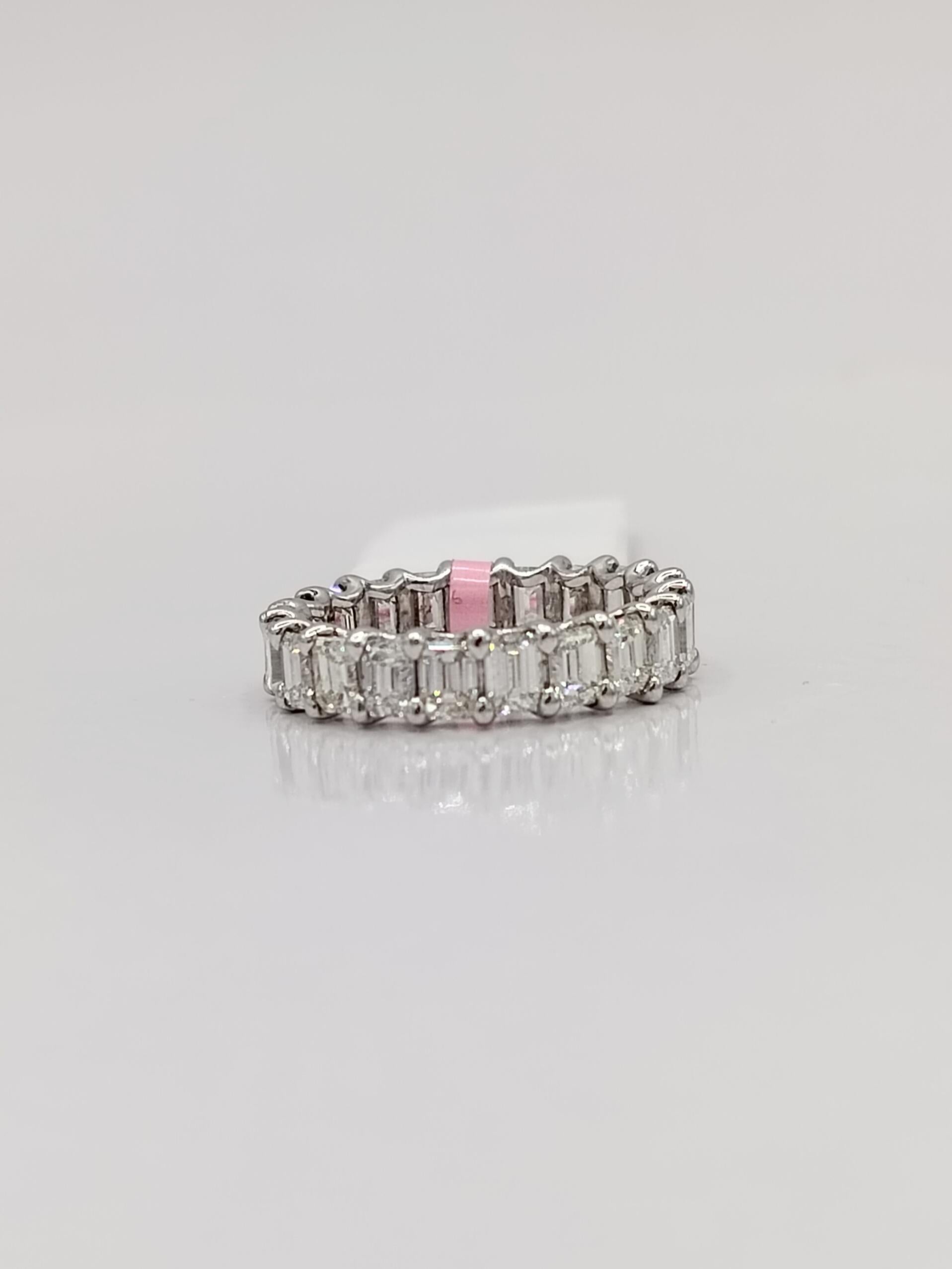 White Diamond Emerald Cut Eternity Band Ring in 18K White Gold For Sale 2