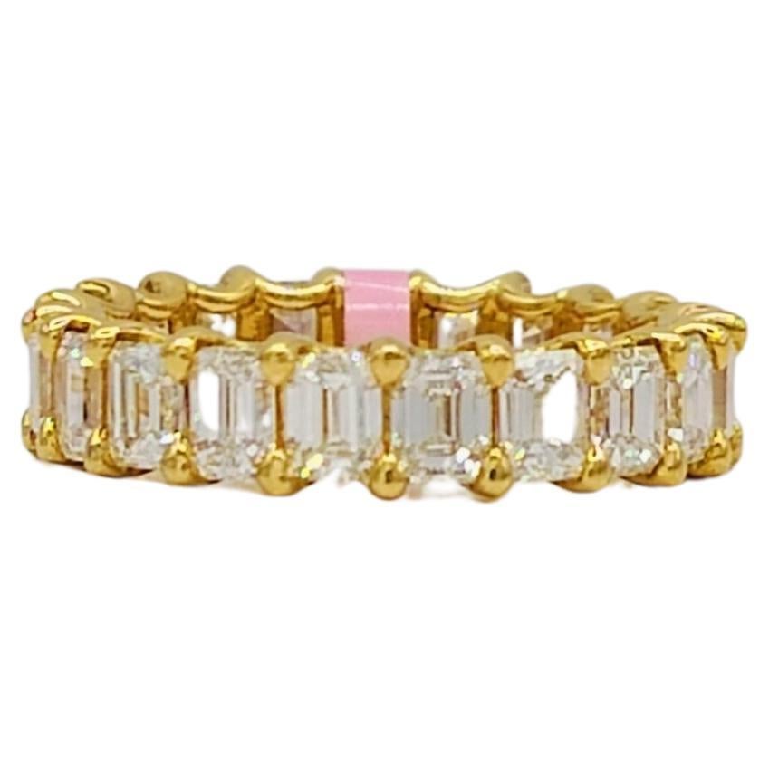 White Diamond Emerald Cut Eternity Band Ring in 18K Yellow Gold For Sale