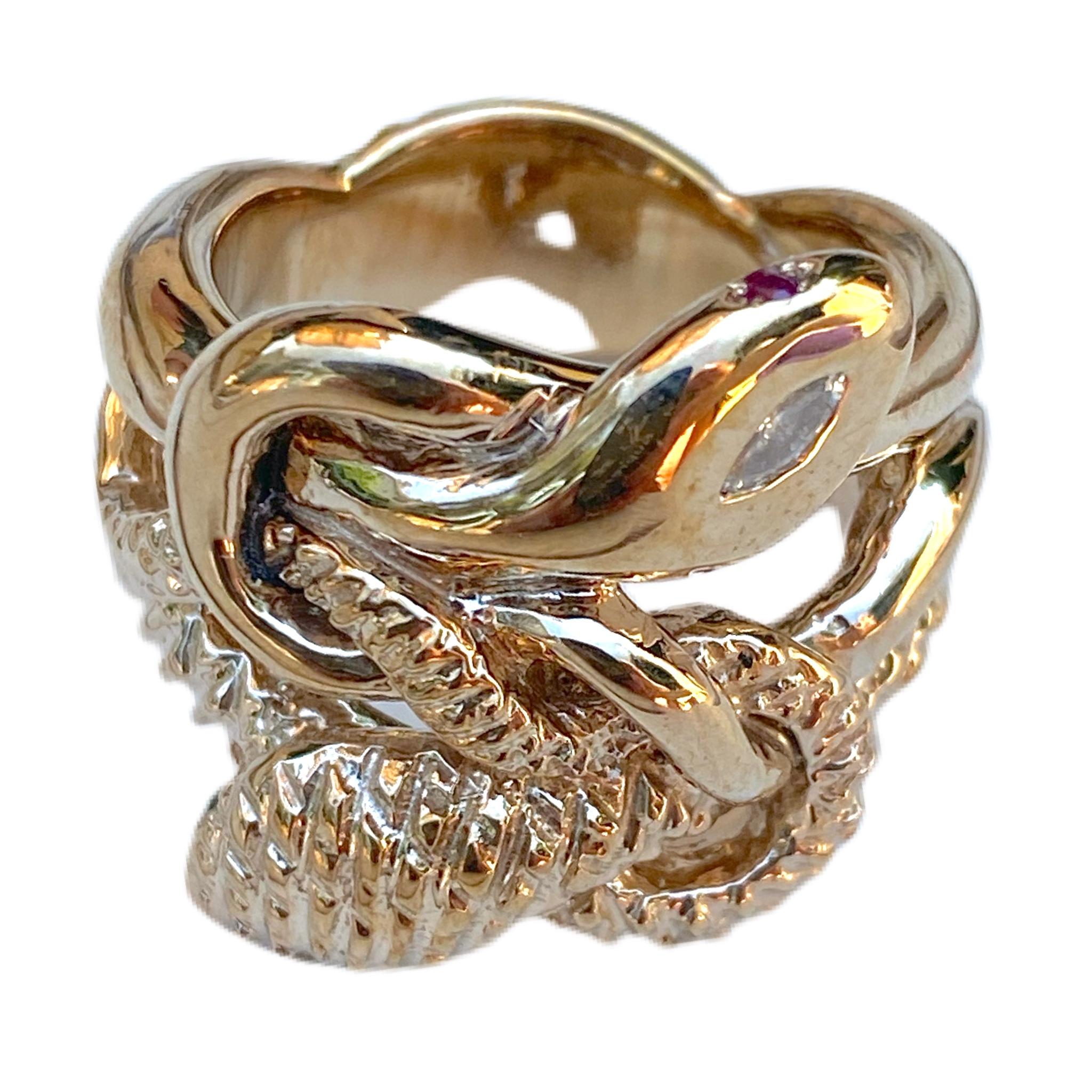 White Diamond Marquis Emerald Ruby Snake Ring Cocktail Ring Gold Vermeil J Dauphin

1 marquis White Diamond 2 pcs Emerald 2 pcs Ruby 
J DAUPHIN 