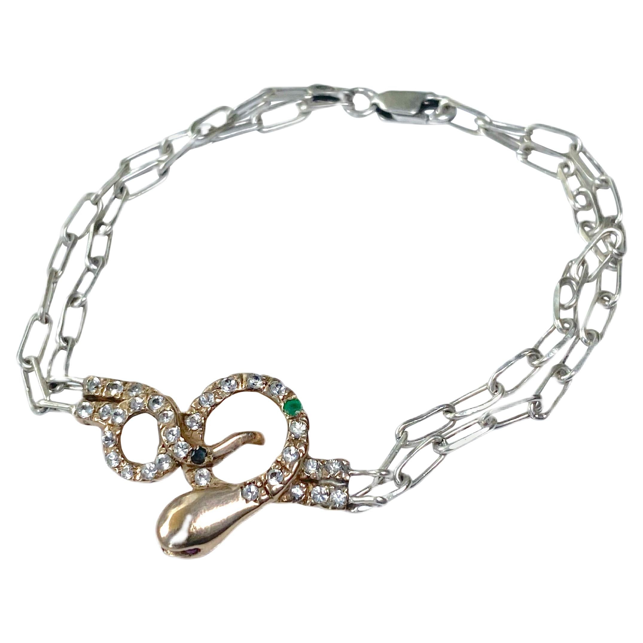 Bracelet serpent en émeraude blanche, diamants blancs, diamants noirs, rubis et chaîne en argent