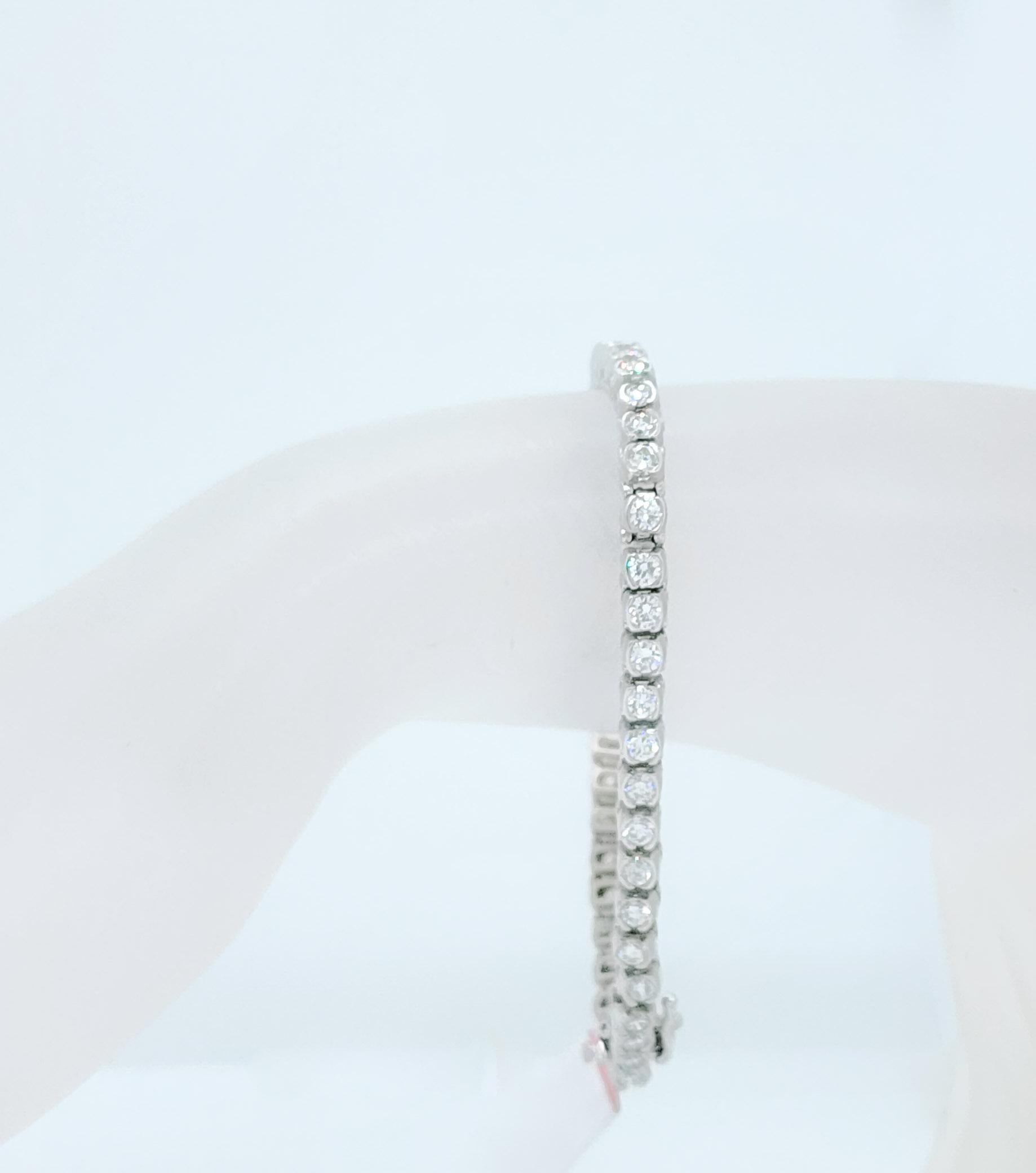 Round Cut White Diamond Half Bezel Set Tennis Bracelet in 14k White Gold For Sale