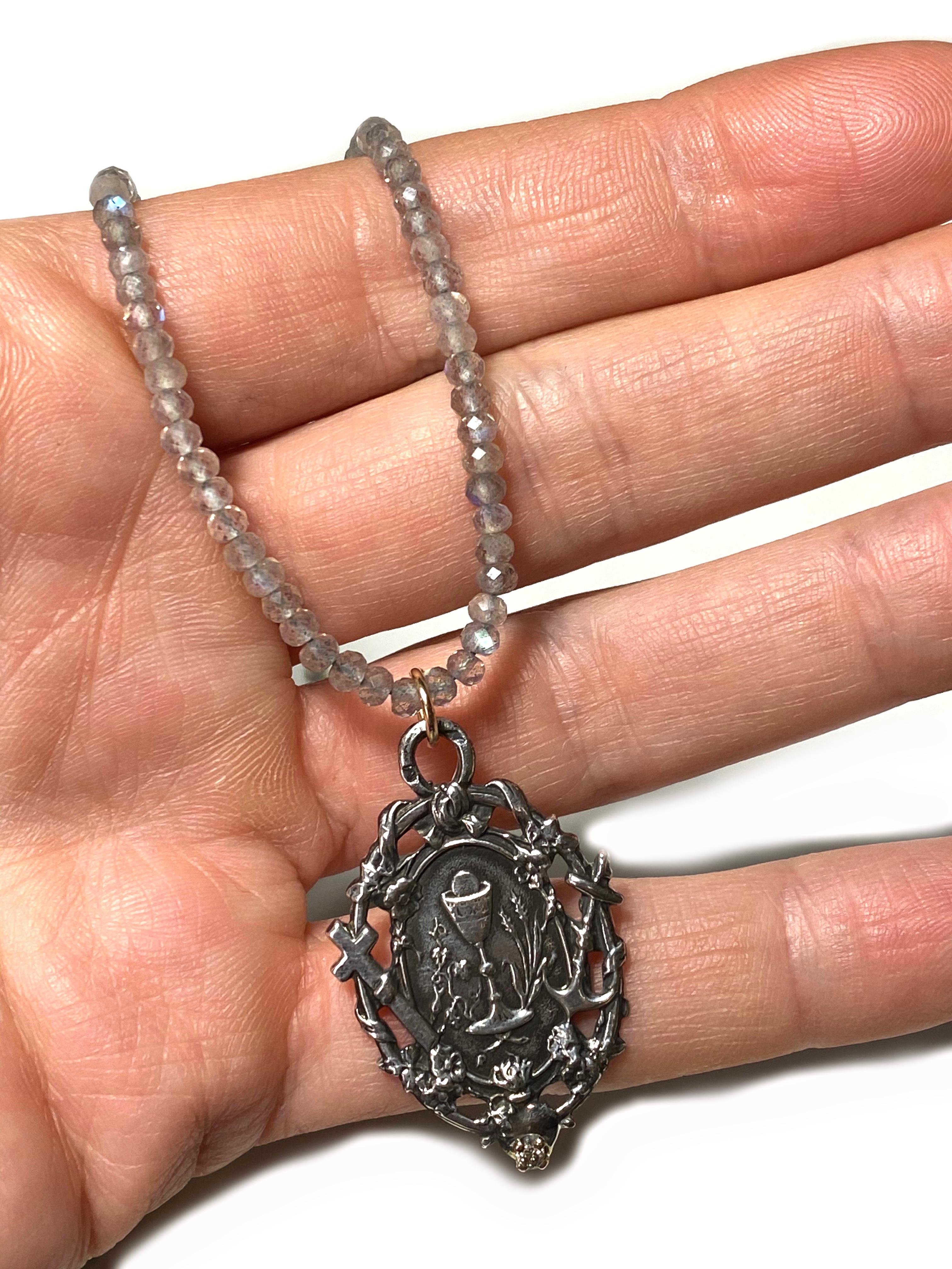White Diamond Medal Faith Hope Love Sterling Silver Labradorite Bead Necklace

Labradorite bead Love Faith Hope Medal pendant Medal Pendant White Diamond set in a gold prong. Natural Bead Necklace is 18' long but can be made shorter or longer on