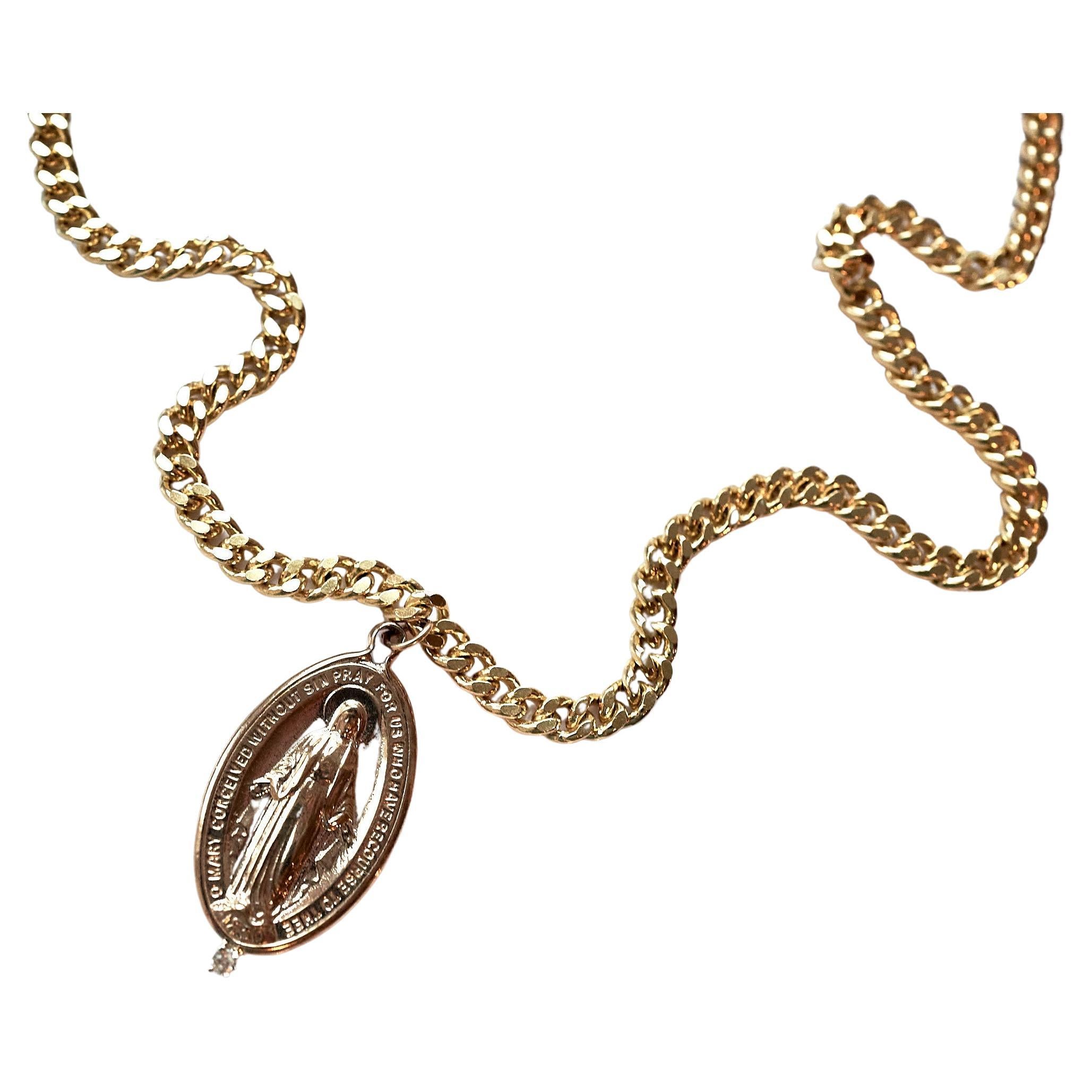 White Diamond Medal Virgin Mary Oval Medal Chain Necklace J Dauphin
Designer: J Dauphin
10k Gold Plated Chain
Medal Bronze

Symbols or medals can become a powerful tool in our arsenal for the spiritual. 
Since ancient times spiritual pendants,