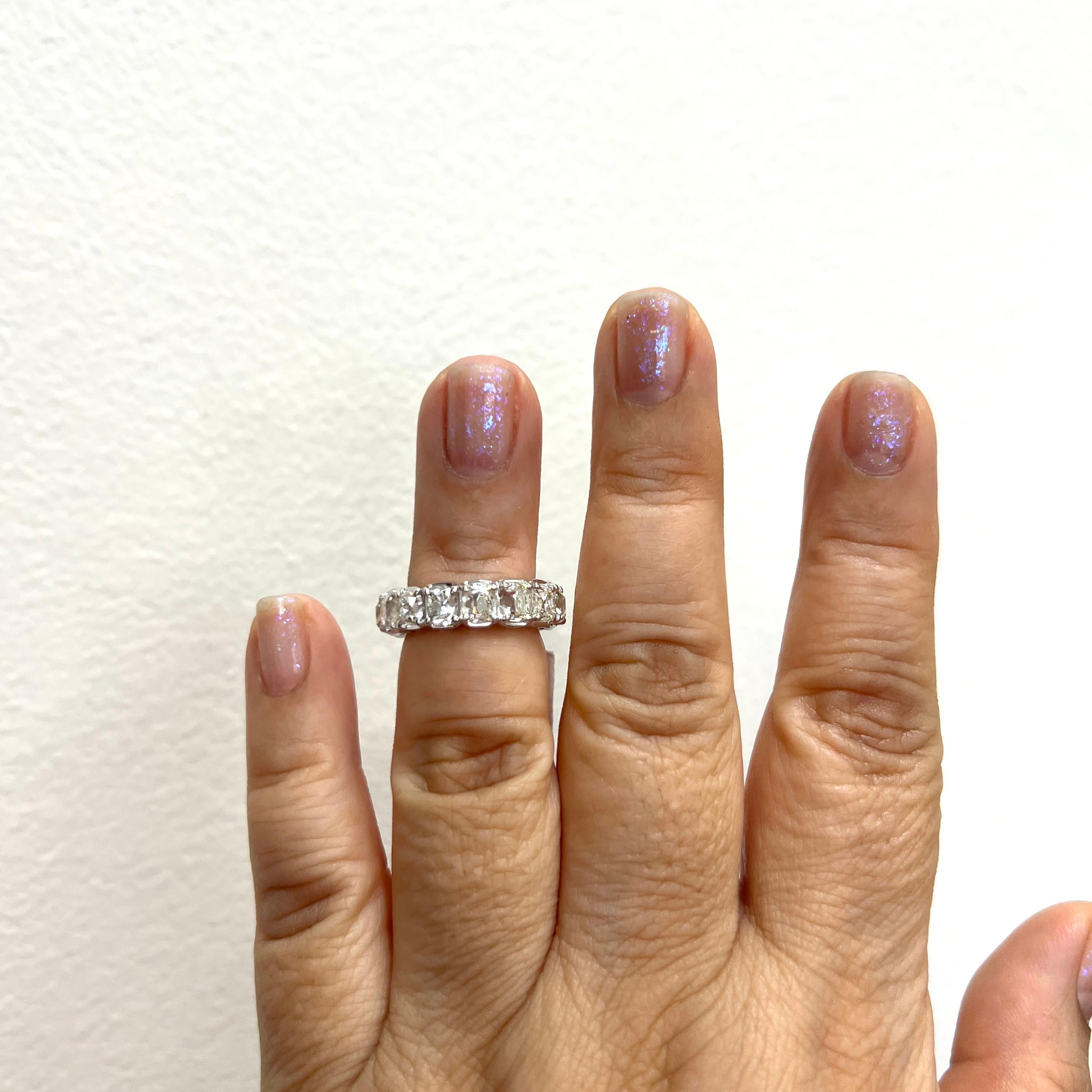 Beautiful 7.46 ct. white diamond old European cuts.  Total of 15 stones.  Handmade in platinum.  Ring size 5.