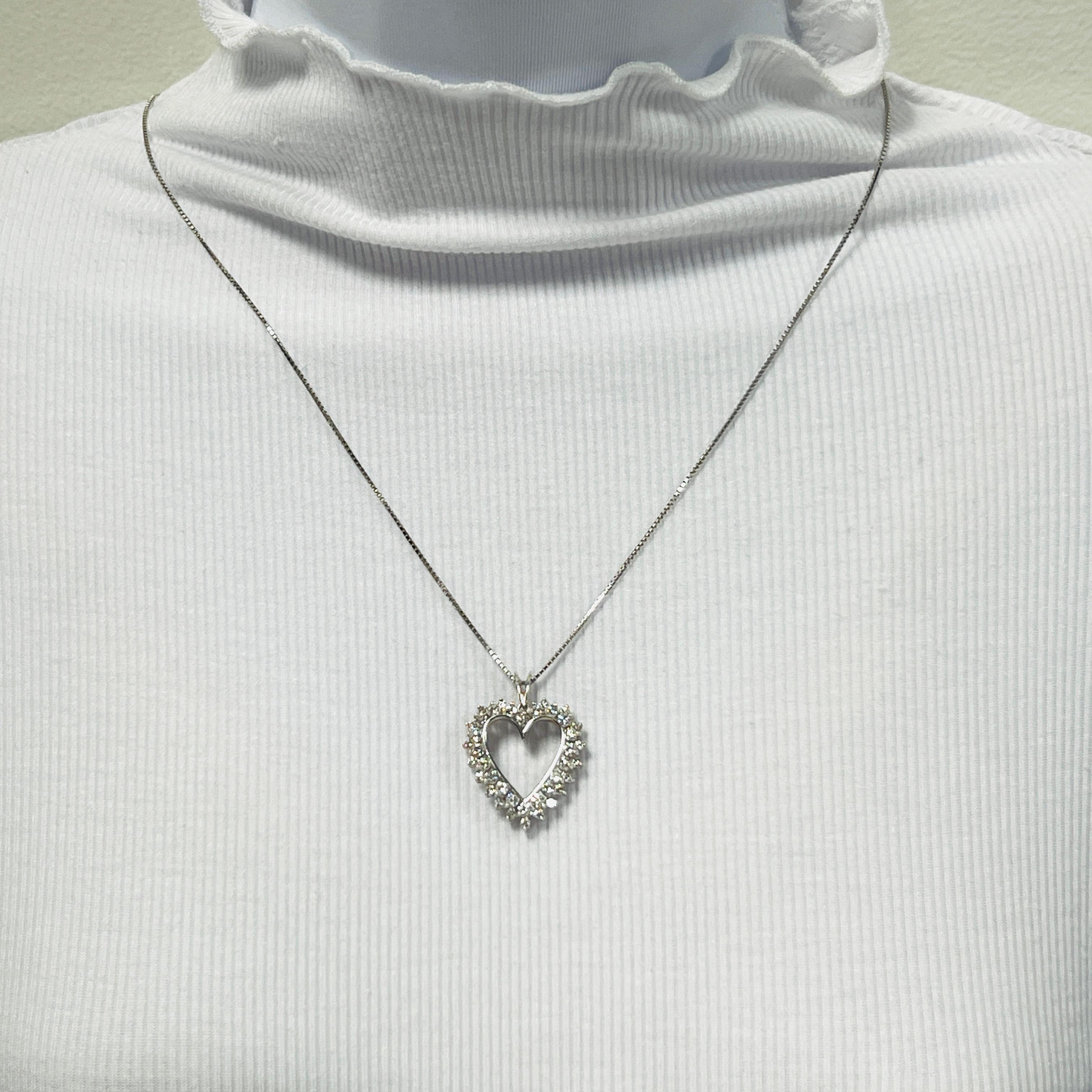 Beautiful 1.00 ct. good quality, white, and bright diamond rounds.  Handmade in 14k white gold.  Length of chain is 24
