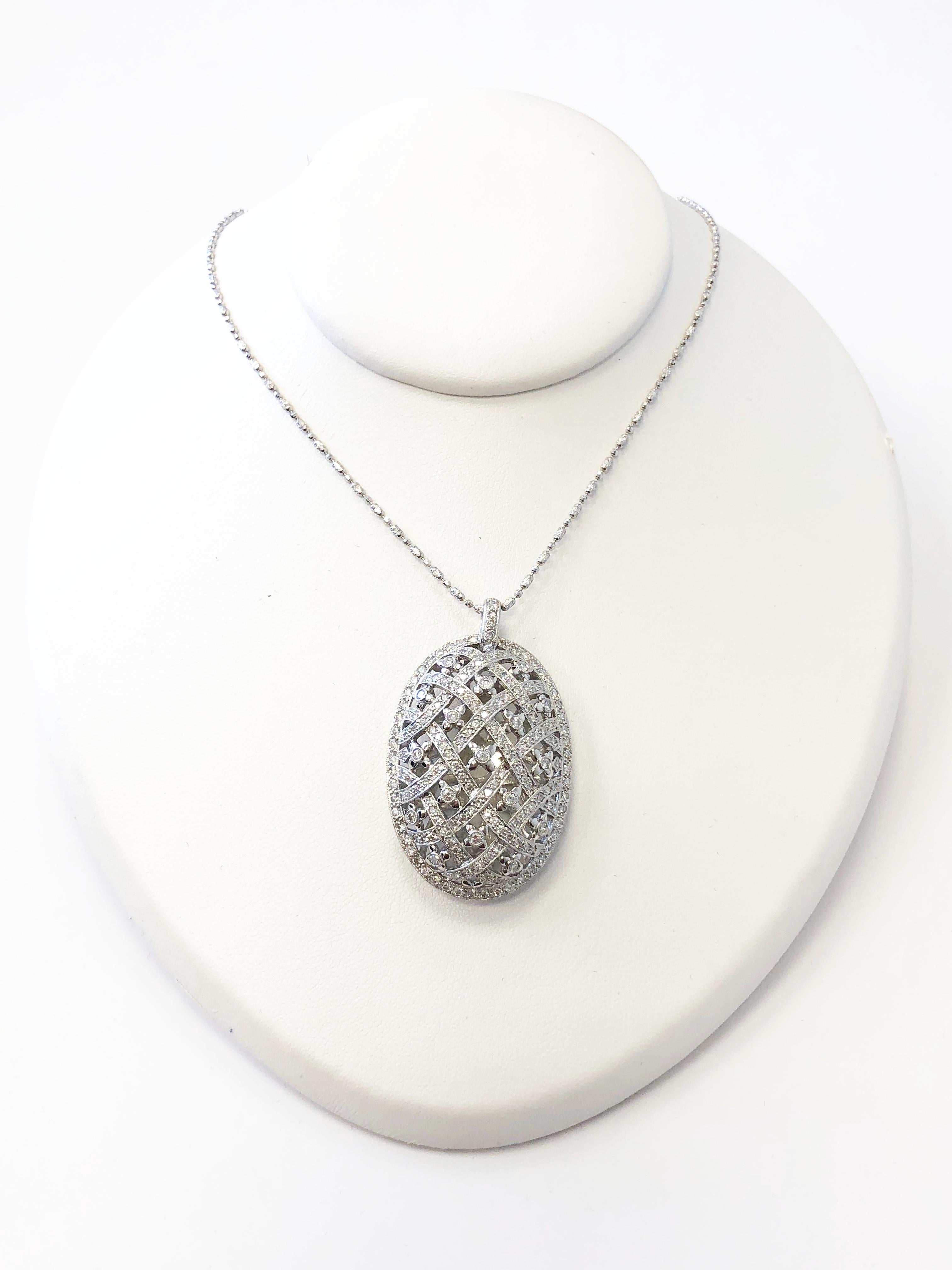Pretty white diamond oval design pendant necklace with 2.51 carats of good quality bright white diamonds and a handcrafted 18k white gold mounting.  Necklace length is 18
