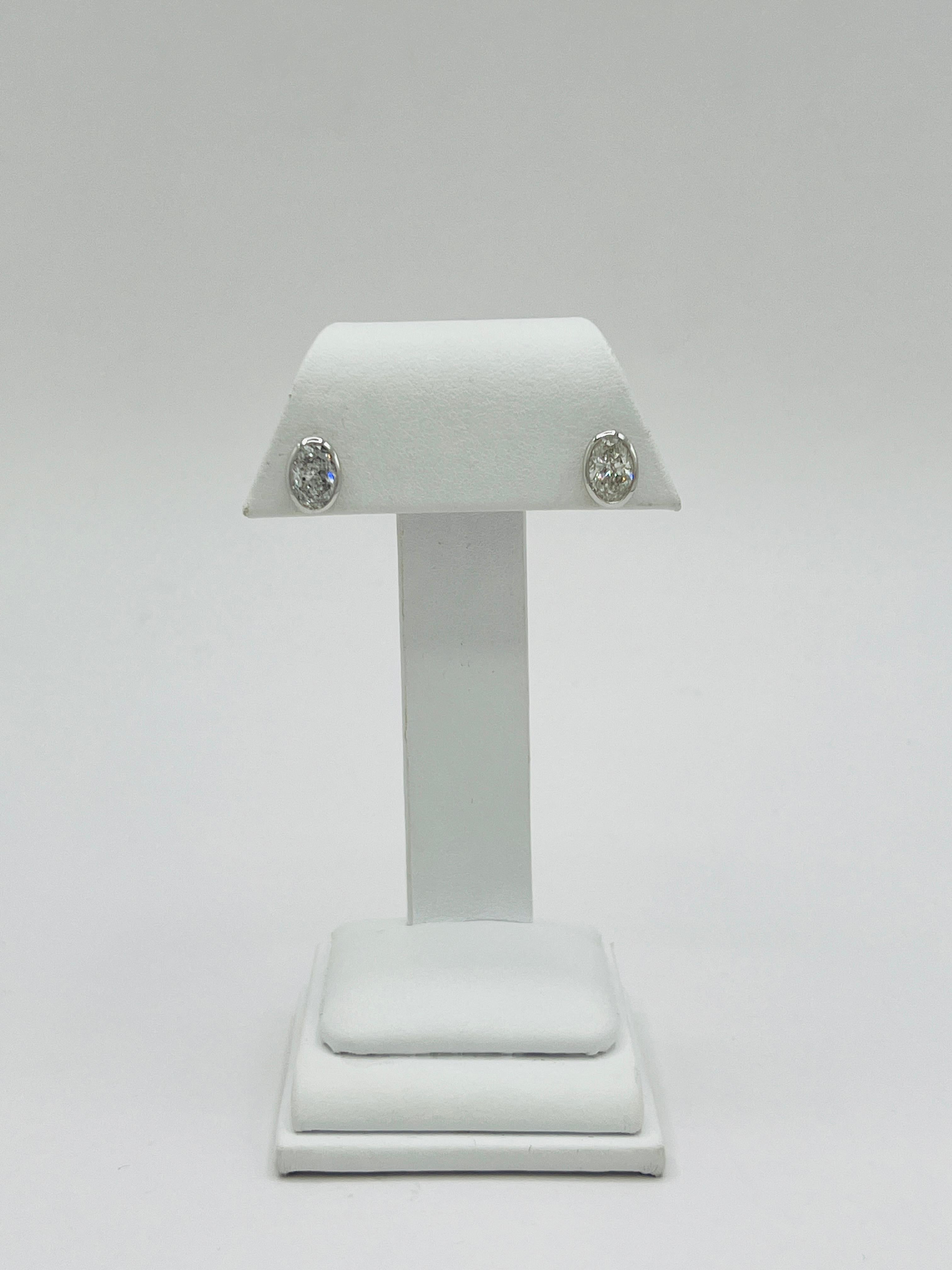White Diamond Ovals 1.50 Carat Each Bezel Stud Earrings in 18K White Gold In New Condition For Sale In Los Angeles, CA
