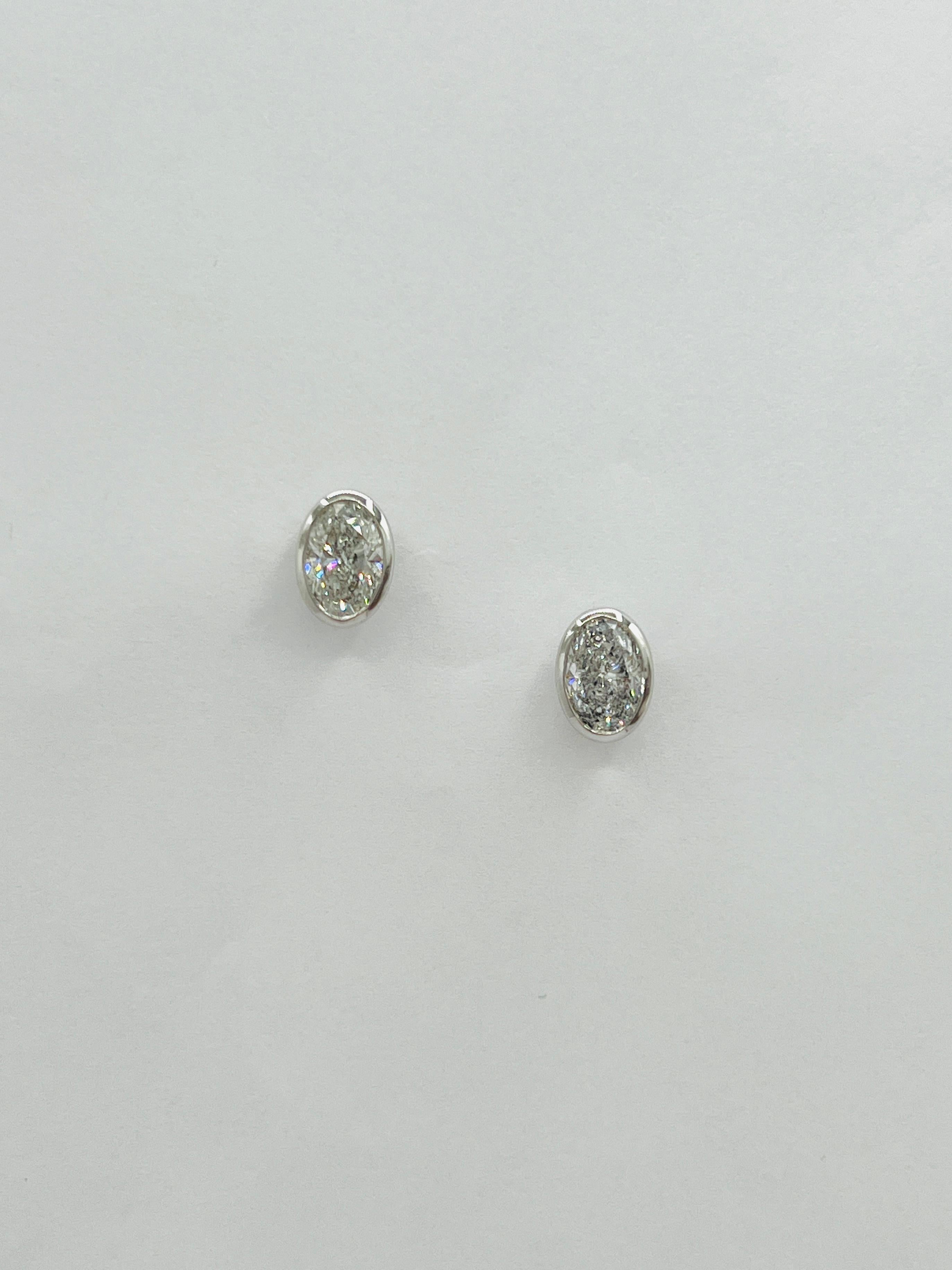 White Diamond Ovals 1.50 Carat Each Bezel Stud Earrings in 18K White Gold For Sale 2