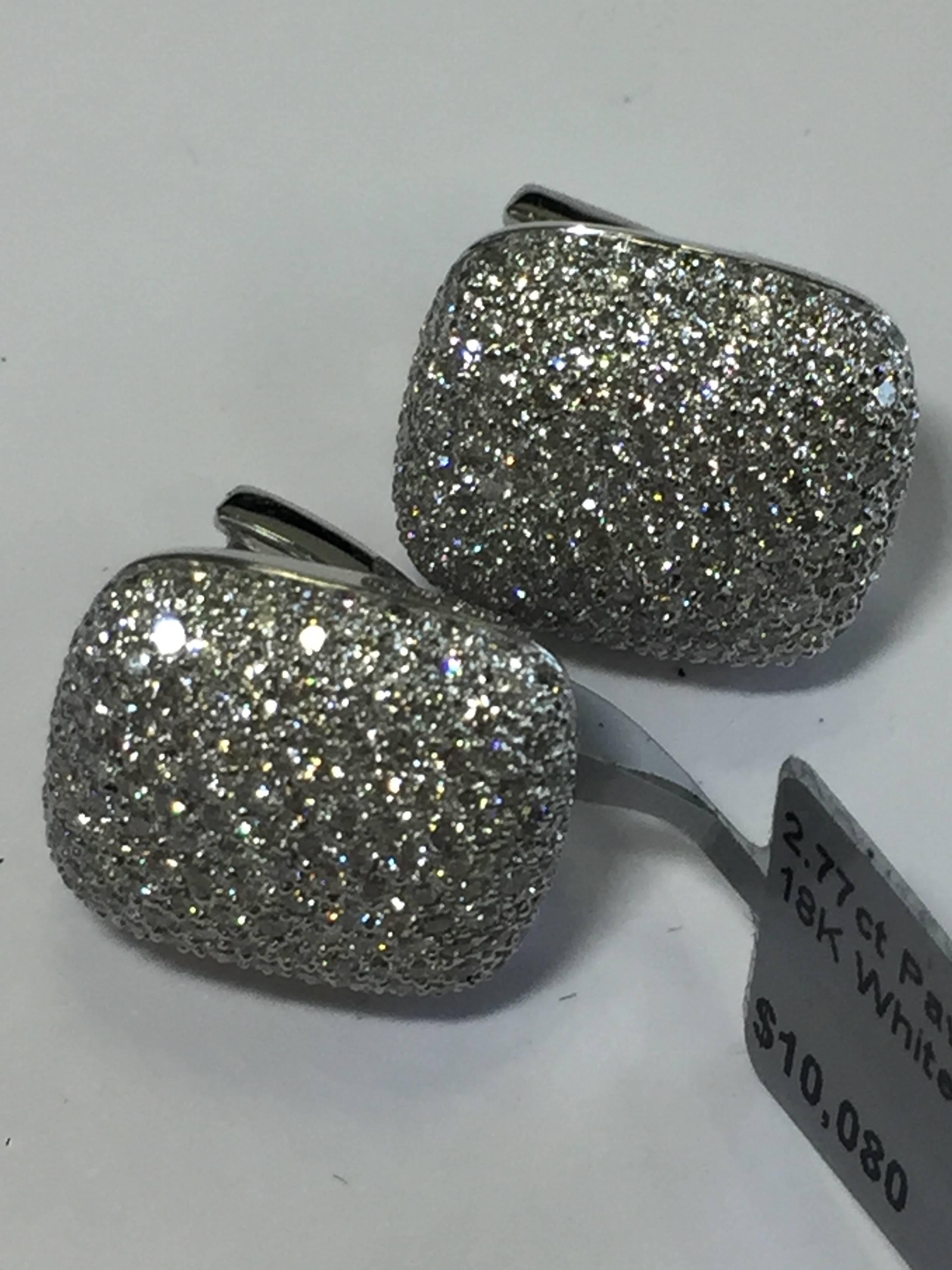 2.77 carats of gorgeous white diamonds in these pave 18k white gold earrings.  Easy to wear for any occasion and a great addition to any collection!