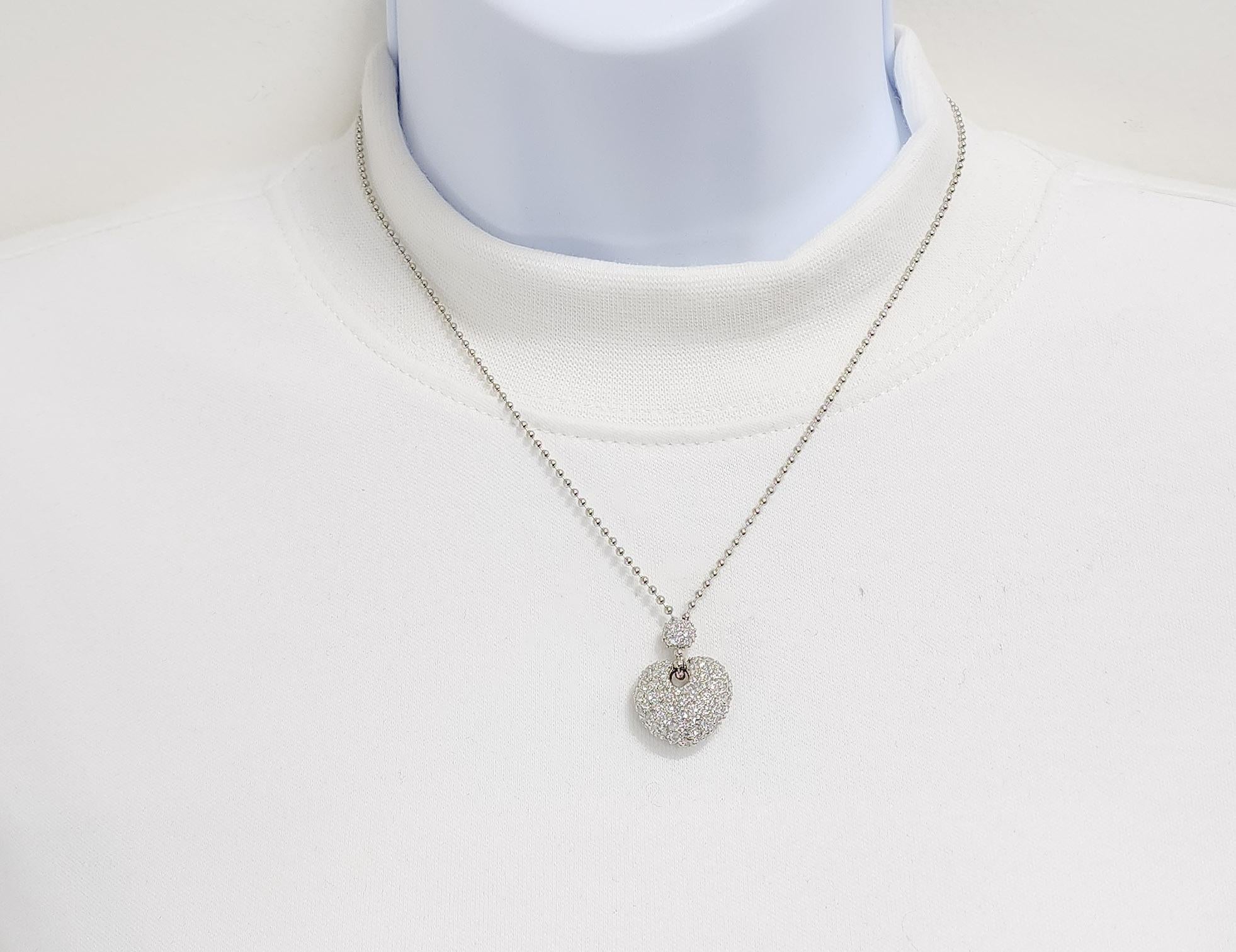Beautiful 2.00 ct. of good quality white diamond round pave heart shape necklace.  Handmade in platinum.  Length is 18