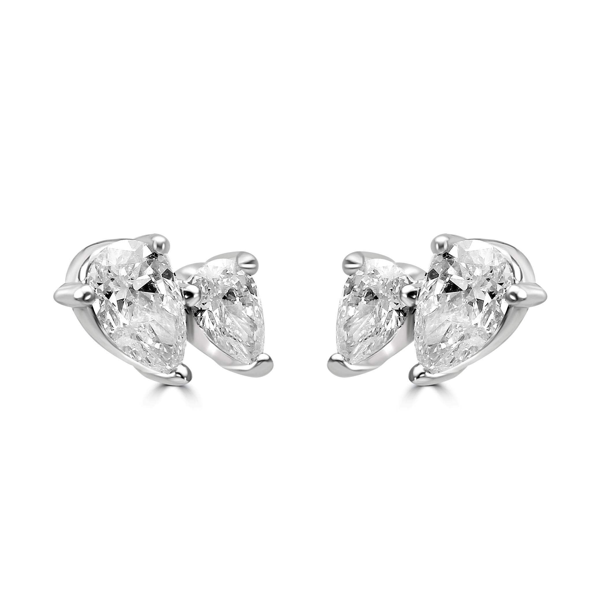 The star of these earrings are the exquisite Pear-Shaped White Diamond, a classic and graceful choice that exudes timeless beauty. The 