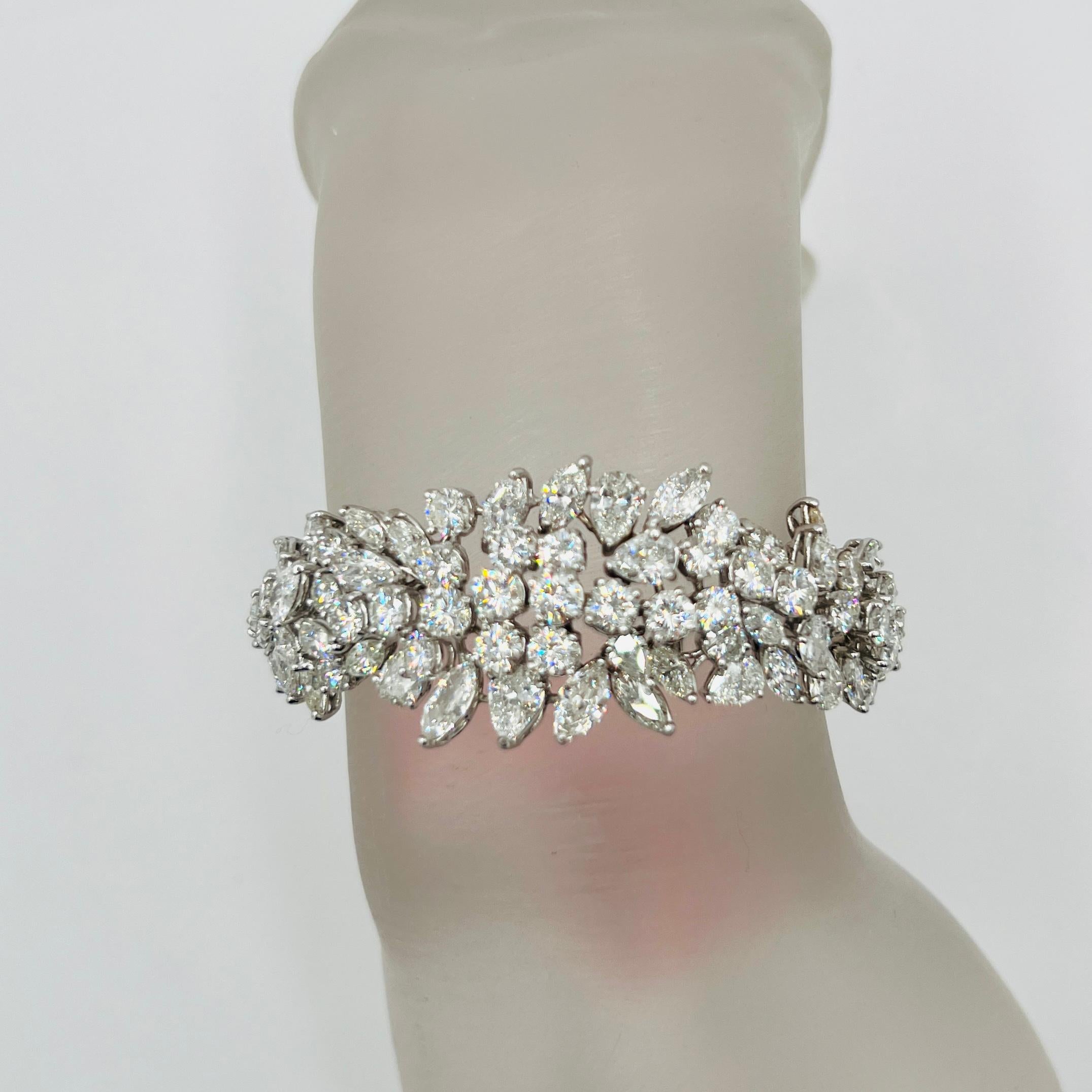 Gorgeous 22.00 ct. of white and bright diamond marquise shapes, pears, and rounds.  Handmade in platinum.  Length is 7