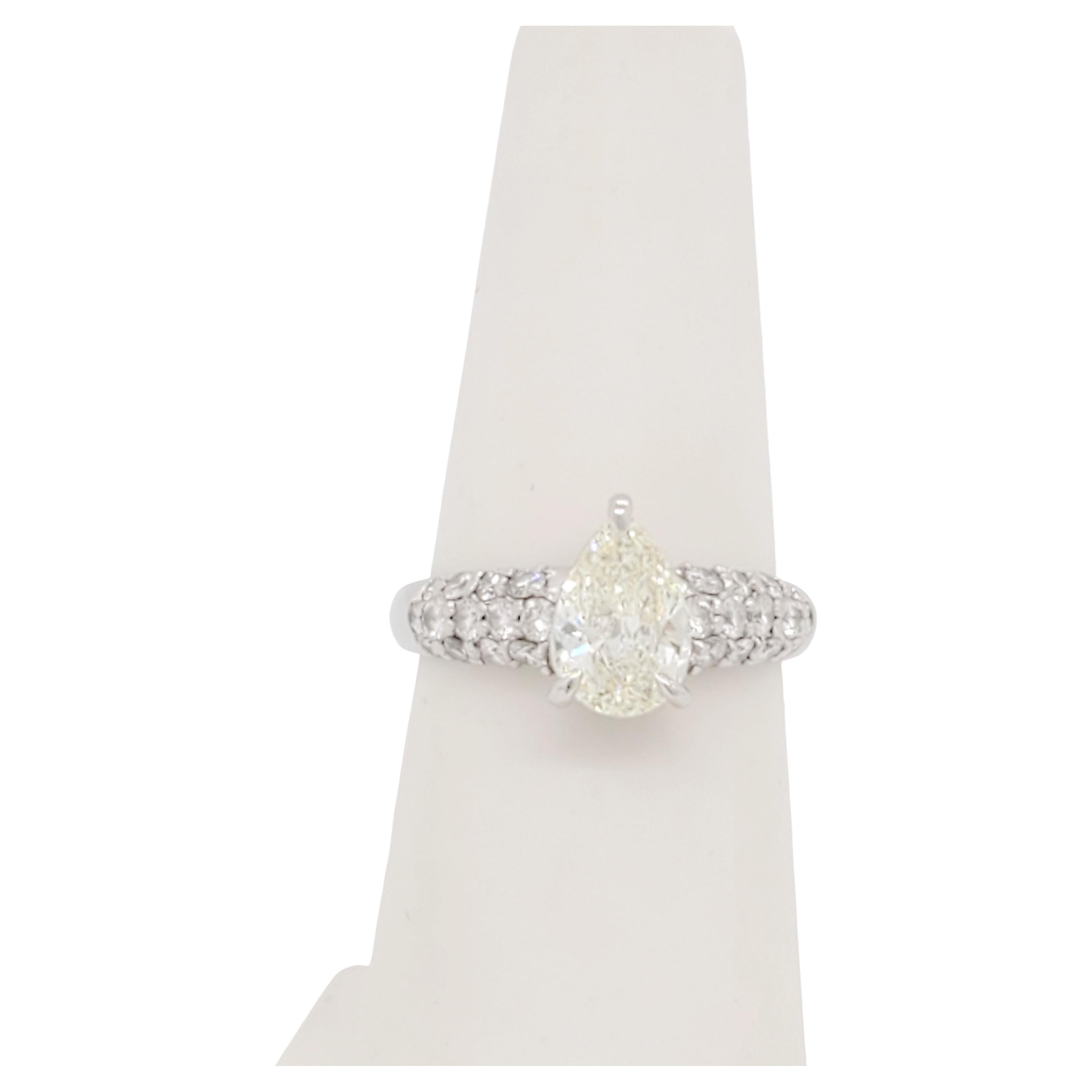 White Diamond Pear Shape Engagement Ring in Platinum