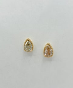 White Diamond Pear Shape Stud Earrings in 18K Yellow Gold