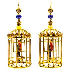 Boucles d'oreilles "cage d'oiseau" en or jaune, diamant blanc, perle, tanzanite, opale et émail