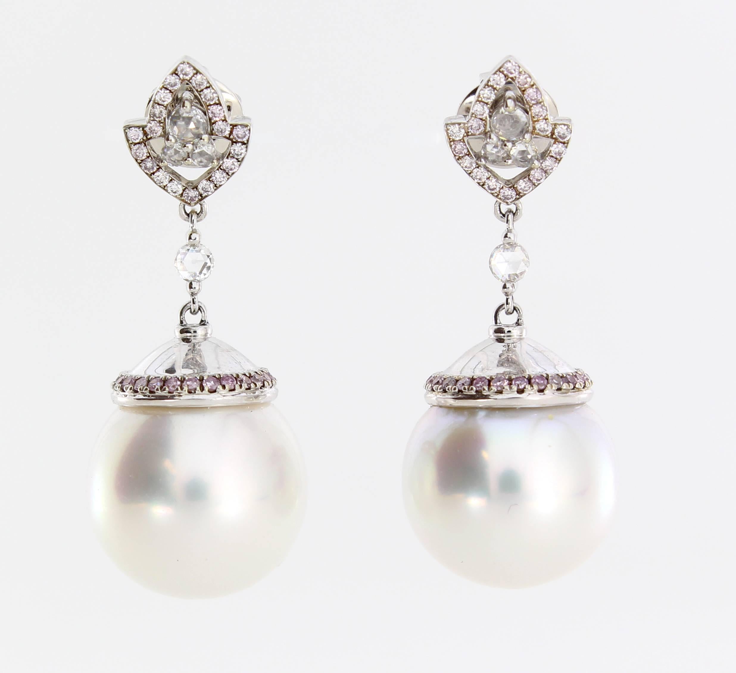 The Blush Earrings are from the AUTORE Timeless Collection. 
This piece is crafted in 18k White Gold with White Diamonds (H SL1 0.26ct Rose Cut), Pink Diamonds (0.576ct Rose Cut) and White 15mm Drop South Sea Pearls.  