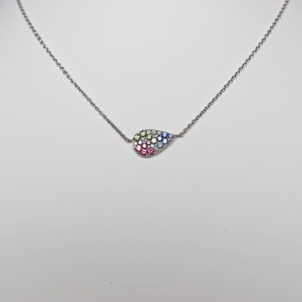 One of a kind small asymmetric Pendant with necklace handmade ( no printing or casting involved) in Belgium by jewellery artist Joke Quick in 18K White gold pave set with bright gemstones.

18K White Gold 4.5 g
14 X White DEGVVS Brilliant-cut