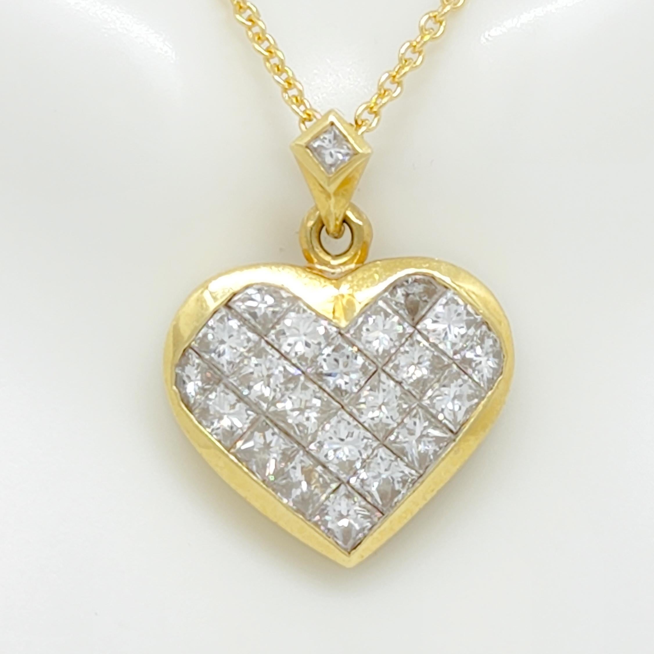 Beautiful 2.75 ct. good quality, white, and bright princess cut diamonds channel set in this heart shape pendant.  There is a single round on the bail also.  Handmade in 18k yellow gold.  Length is 18