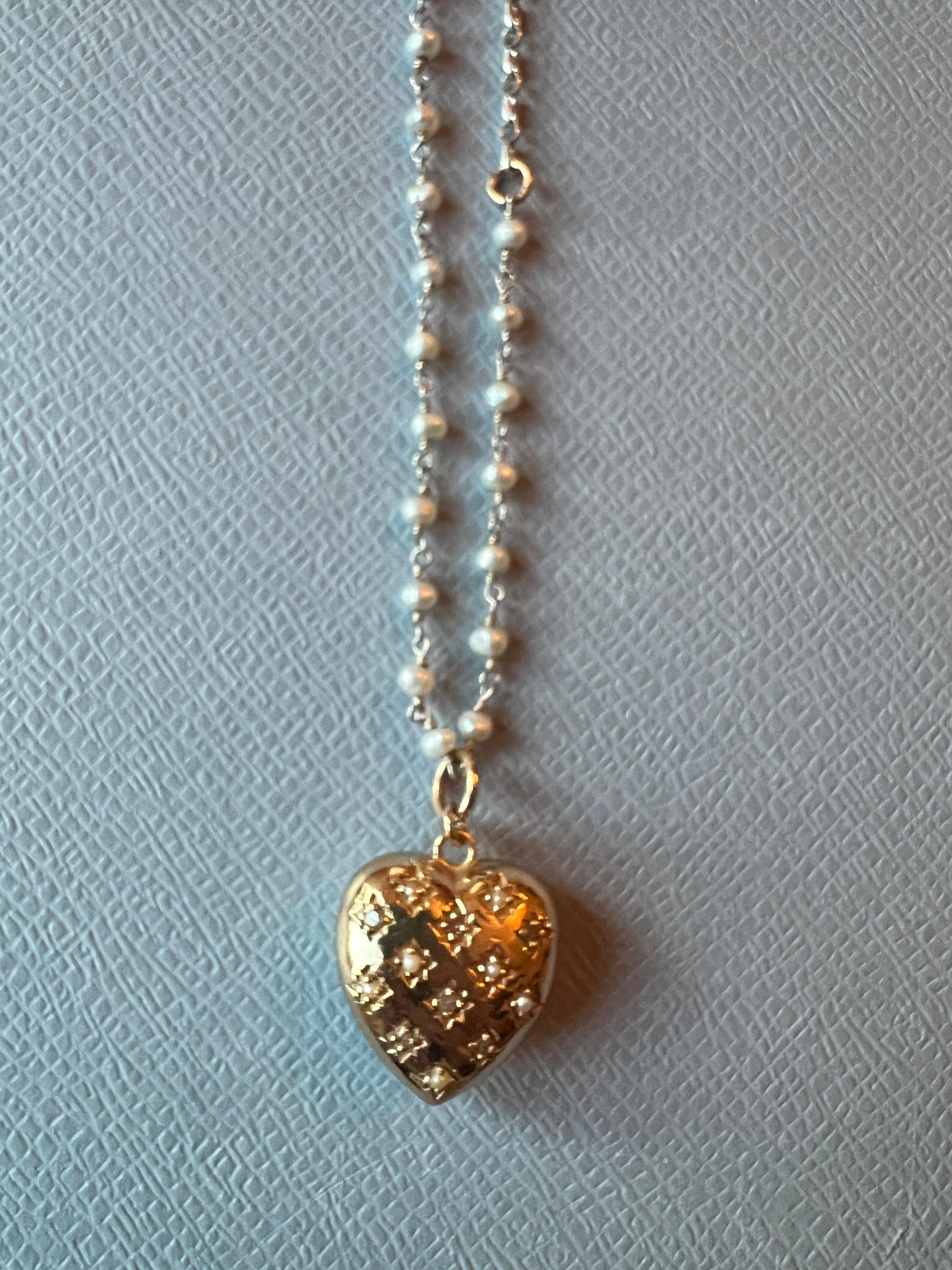 White Diamond Puffy Heart Necklace White Pearl Victorian Style

Designer: J DAUPHIN

Length: 25 inches 

White diamonds hold significant spiritual meaning by embodying purity, clarity, and enlightenment. They are believed to amplify the wearer’s