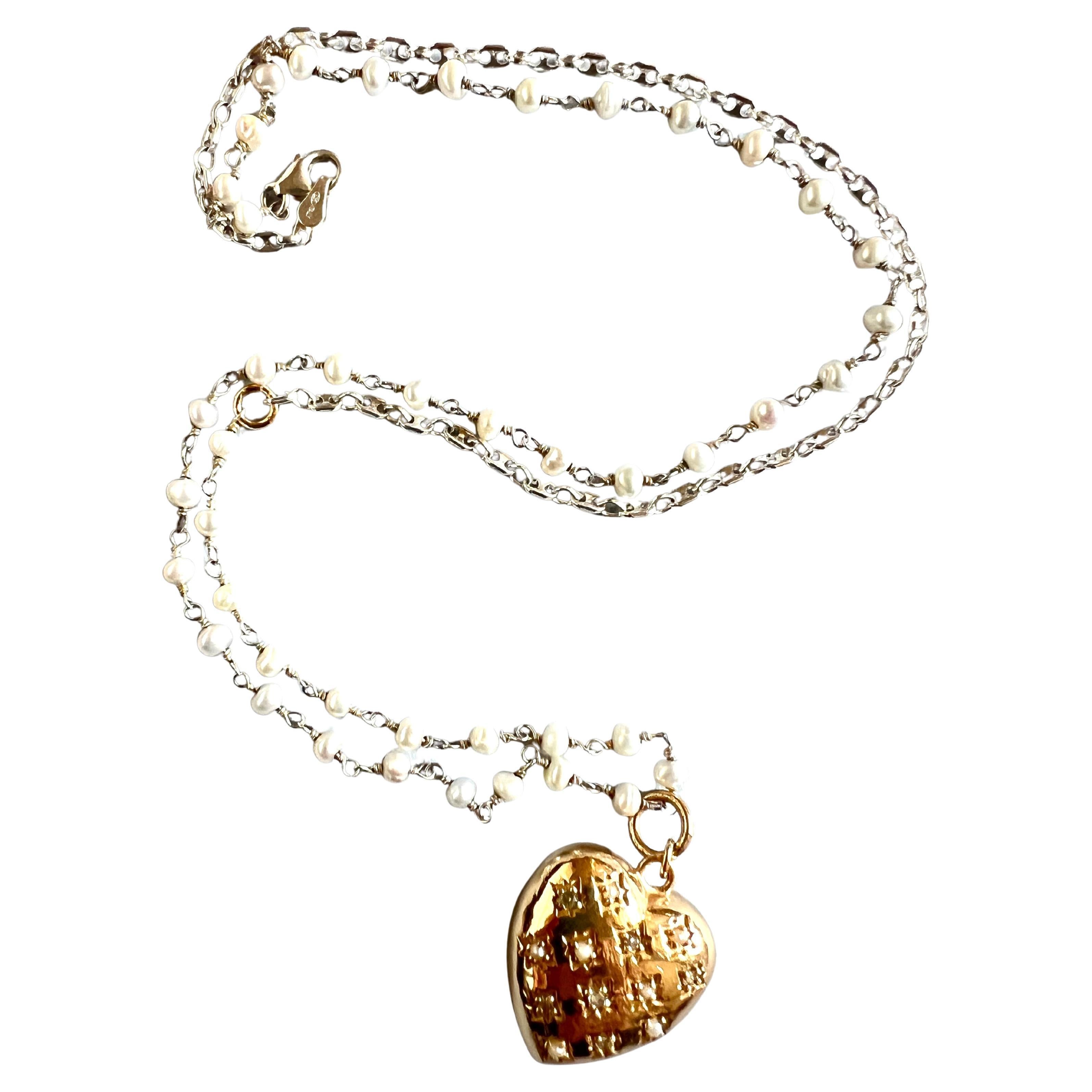 White Diamond Puffy Heart Necklace White Pearl Victorian Style

Designer: J DAUPHIN

Length: 25 inches 

White diamonds hold significant spiritual meaning by embodying purity, clarity, and enlightenment. They are believed to amplify the wearer’s