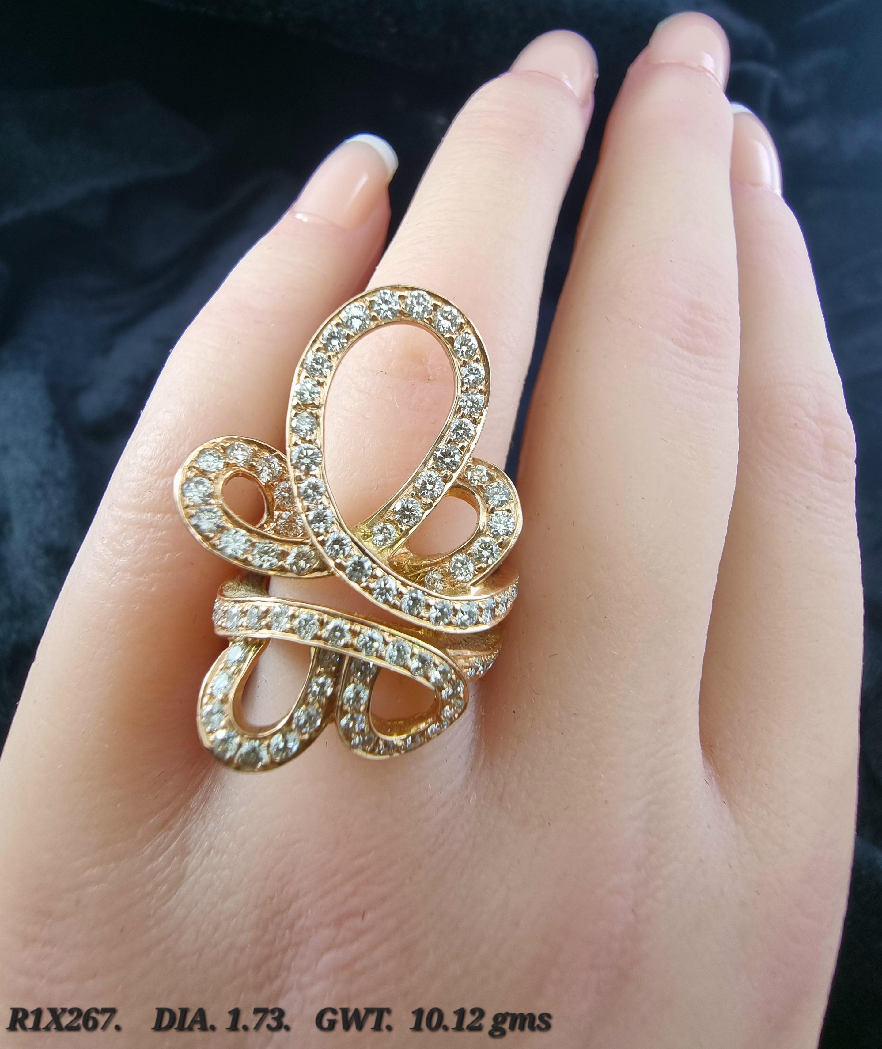 Elegance takes shape in this exquisite white diamond ring, where shimmering diamonds with total weight of 1.73cts., form an intricate pattern of graceful, flowing curves. Set in warm 14K rose gold, the delicate lines create a sense of movement and