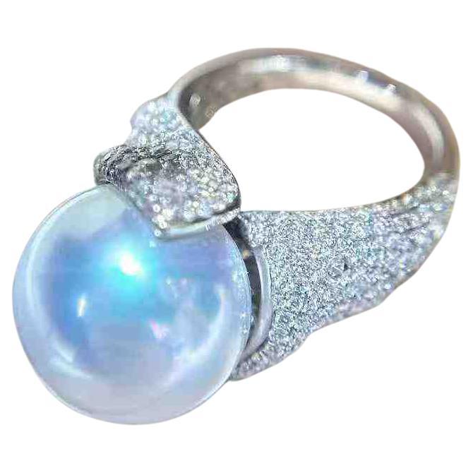 Anello con diamante bianco in oro 18 carati e design a principessa conchiglia in vendita