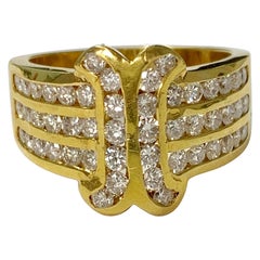 Bague en or jaune 18 carats avec diamants blancs