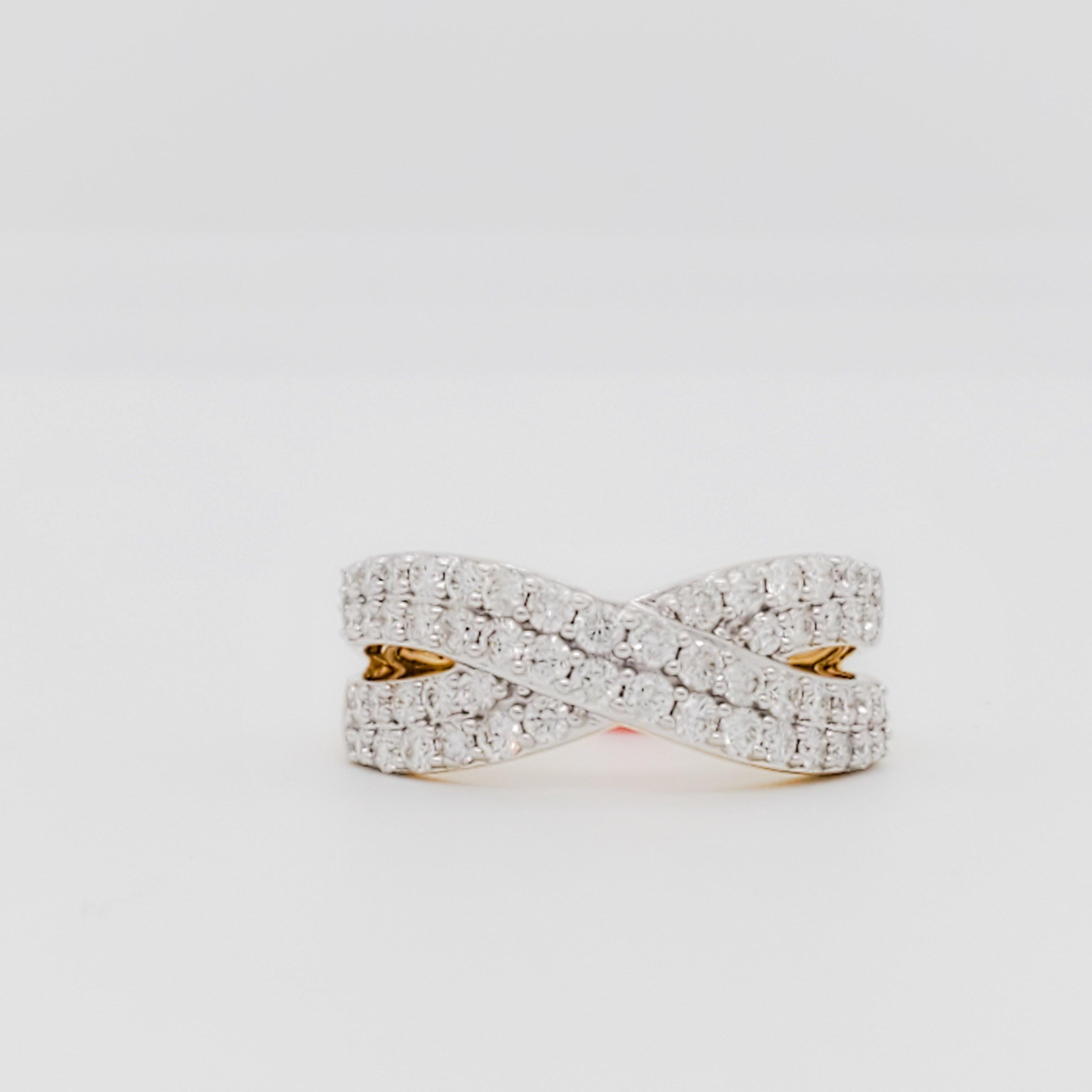 Beautiful diamond ring with 1.00 ct. good quality, white, and bright diamond rounds in a criss cross pattern.  Handmade in 14k yellow gold.  Ring size 7.25.