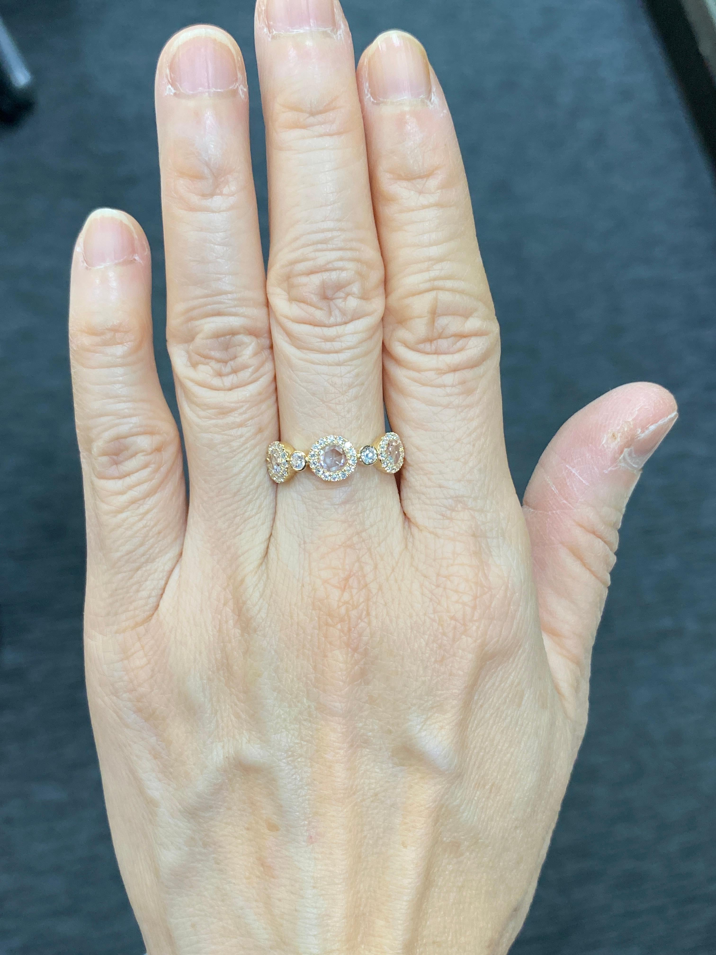 White Diamond Rose Cut 18 Karat Yellow Gold Ring

Magnificent White Rose Cut diamond diamond band, features 0.41 Carats of White Rose Cut Diamonds, surrounded by 0.38 Carats of white round brilliant cut diamonds. 

Ring Size Europe 54 (US 6.75)