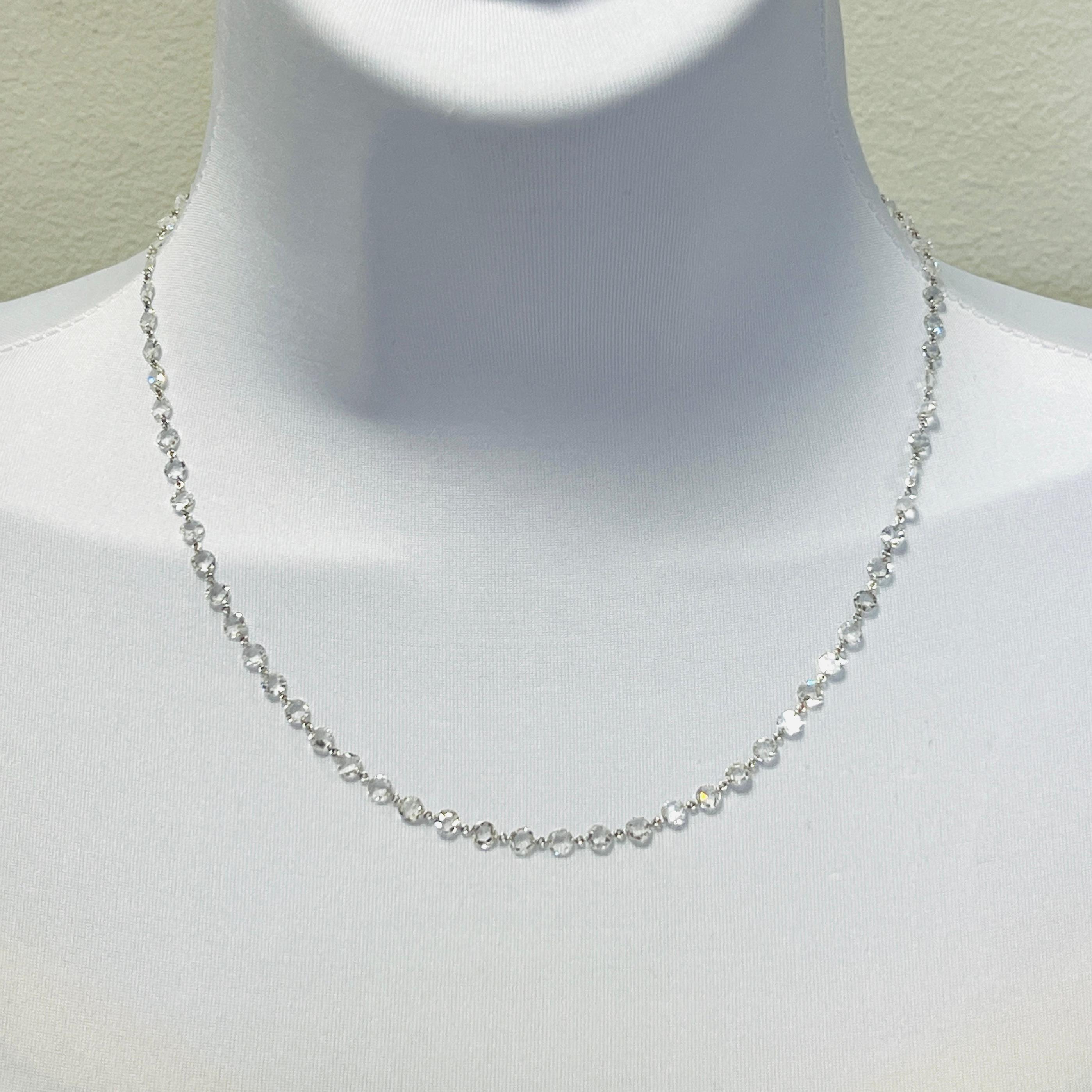 Beautiful 12.99 ct. good quality, white, and bright diamond rose cut rounds.  Handmade in 18k white gold.  Length is 42