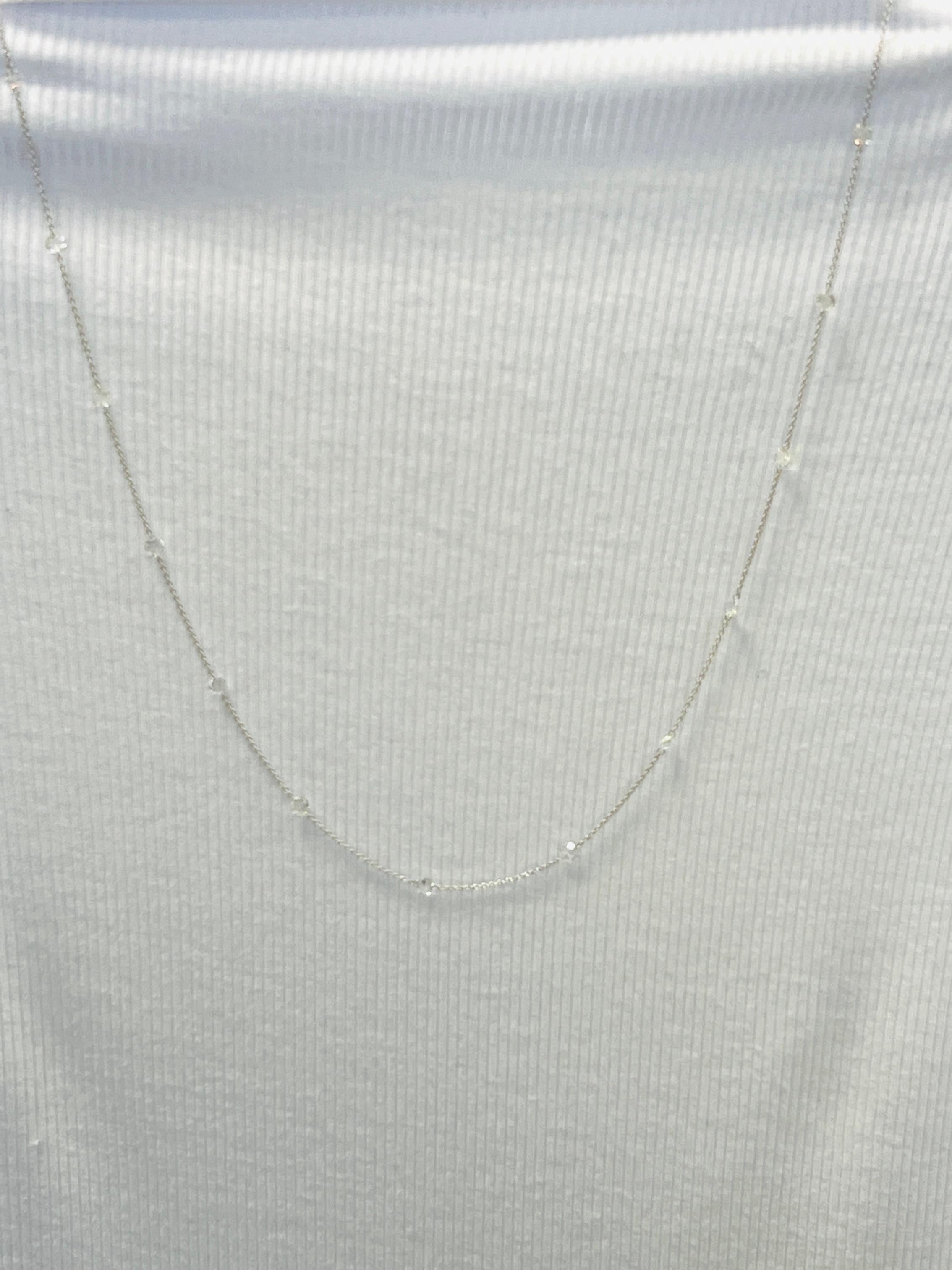 Beautiful 2.04 ct. white diamond rose cut rounds.  Handmade in 18k white gold.  Length is 20