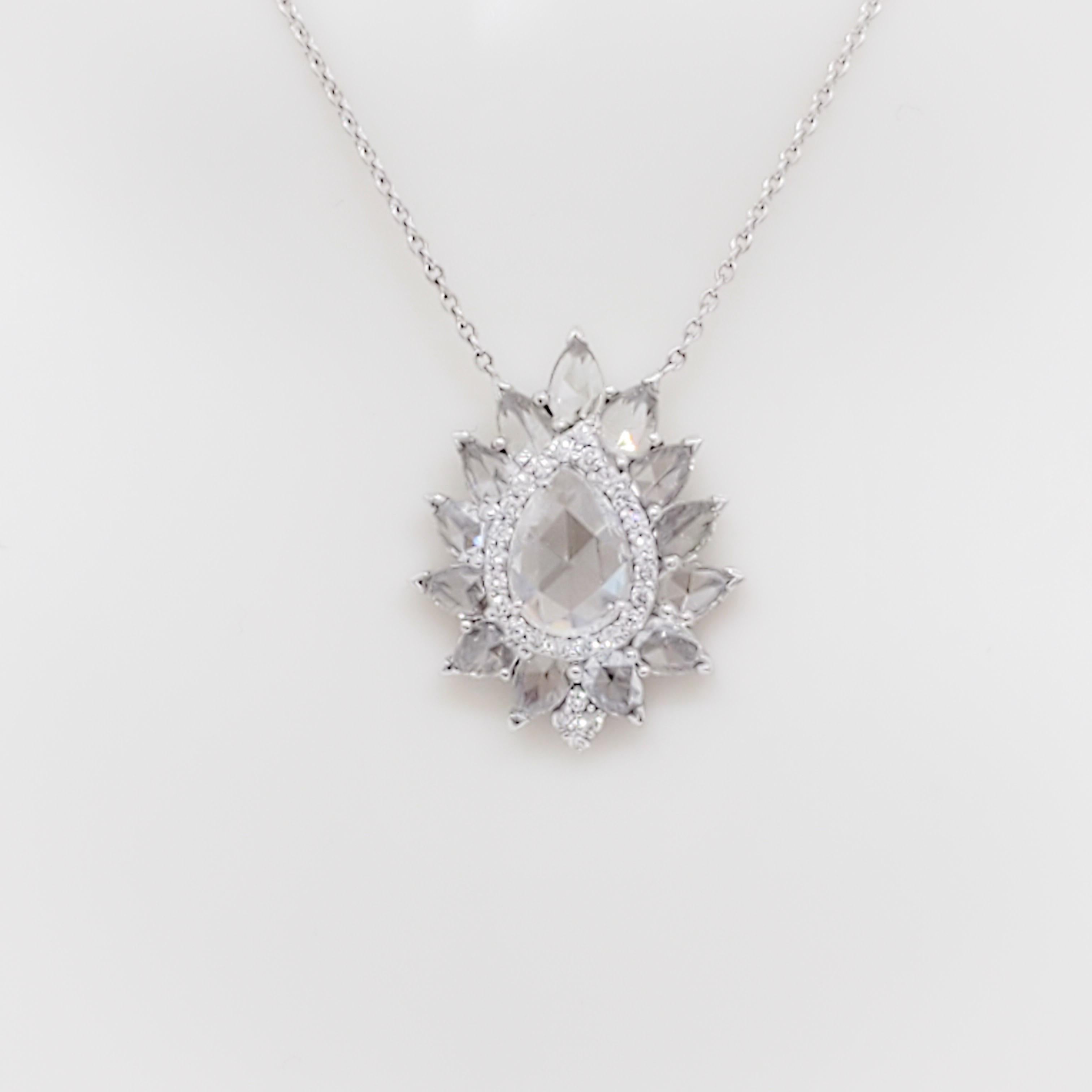 Gorgeous 0.65 ct. rose cut pear shape with 0.80 ct. rose cut pear shapes white diamond rounds handmade in 18k white gold.  This pendant is chic and feminine.  