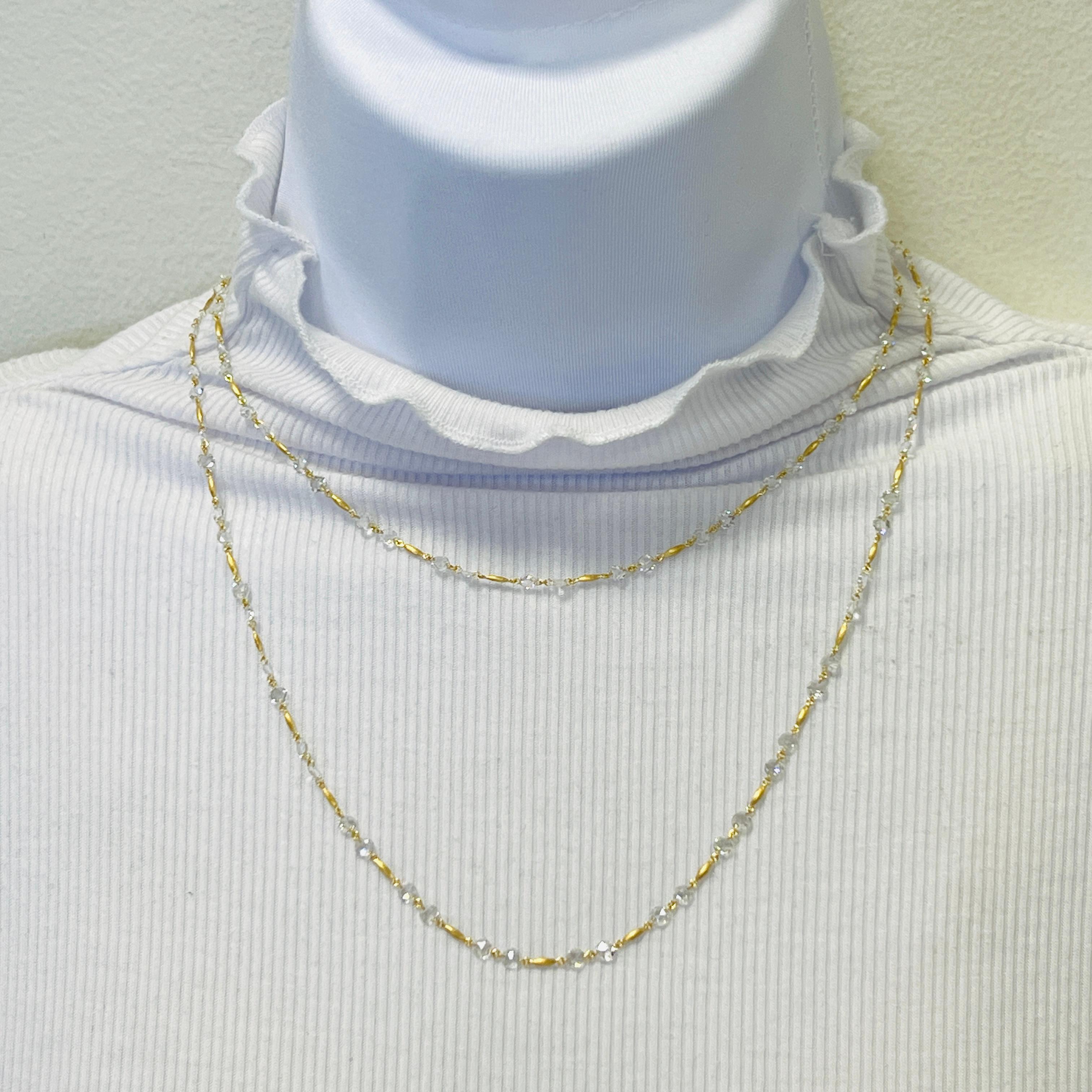 Gorgeous 11.63 ct. good quality, white, and bright diamond rose cut rounds.  Total of 105 stones.  Handmade in 18k yellow gold.  Length is 36
