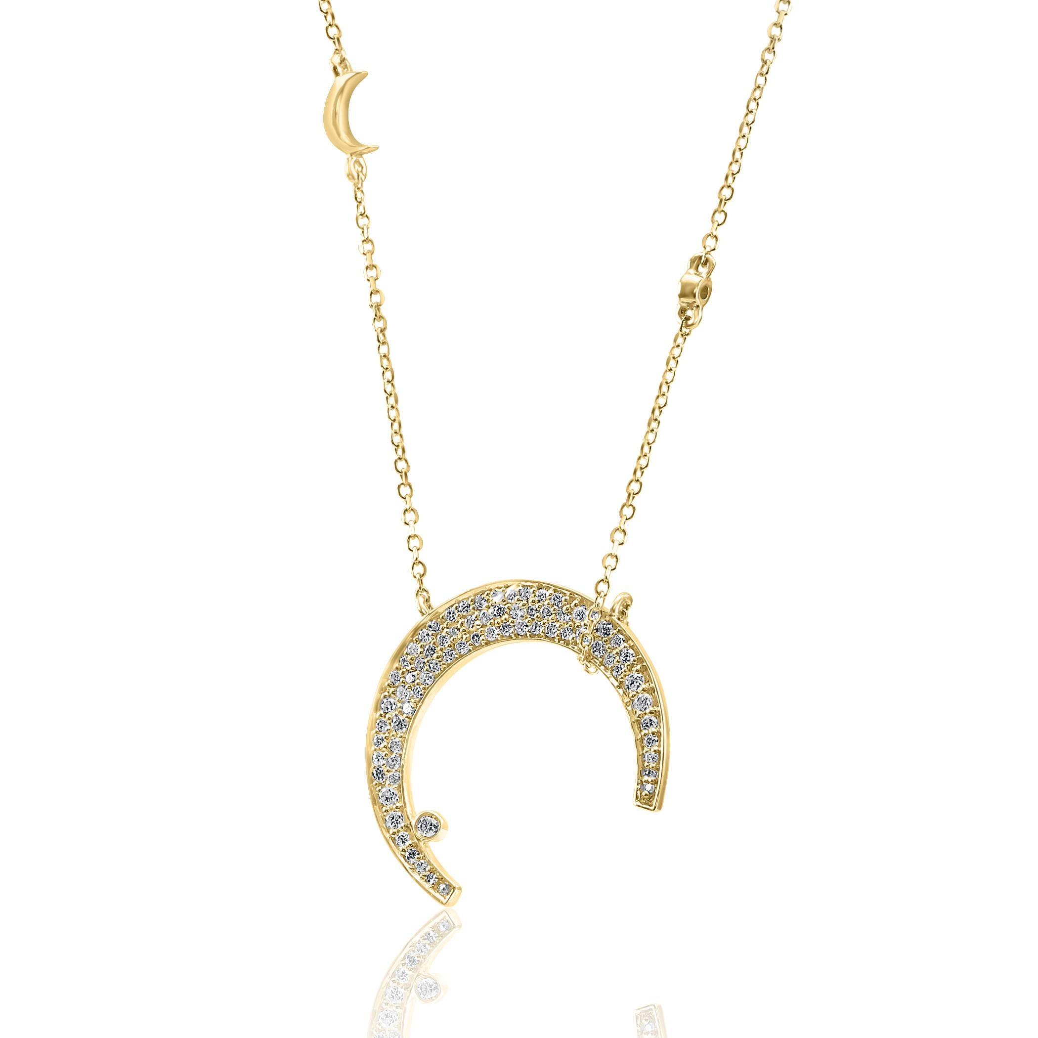 Illuminate your style with our celestial-inspired 14K Yellow Gold Crescent Pendant Necklace, a mesmerizing piece adorned with 74 dazzling diamonds totaling 0.69 carats, these diamonds sparkle like distant stars, adding brilliance to the