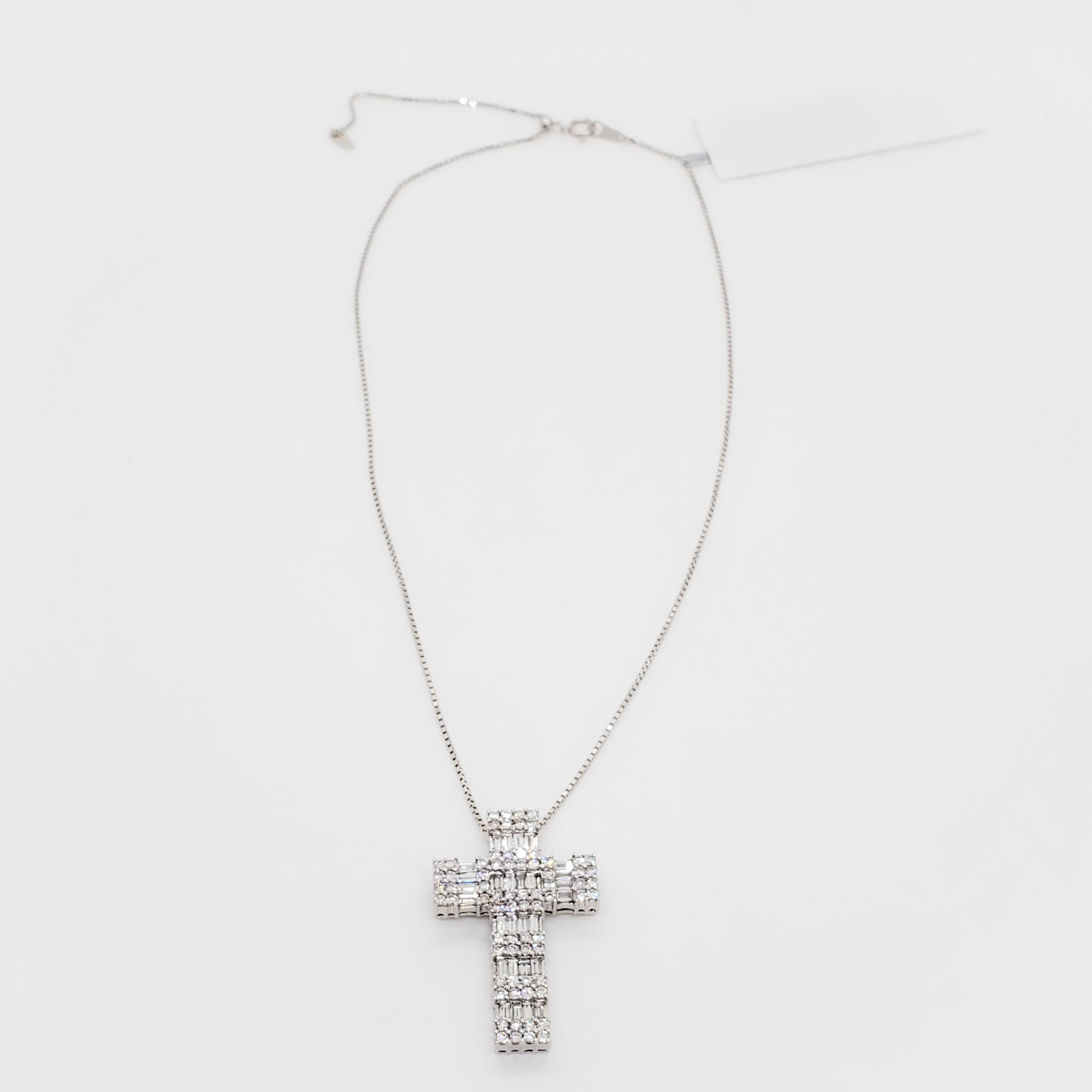 Amazing estate cross pendant necklace showcasing 2.95 cts. of good quality white diamonds in a handmade mounting with a sturdy platinum chain. Length is 18