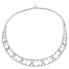 Collier rond et marquise en or blanc 18 carats