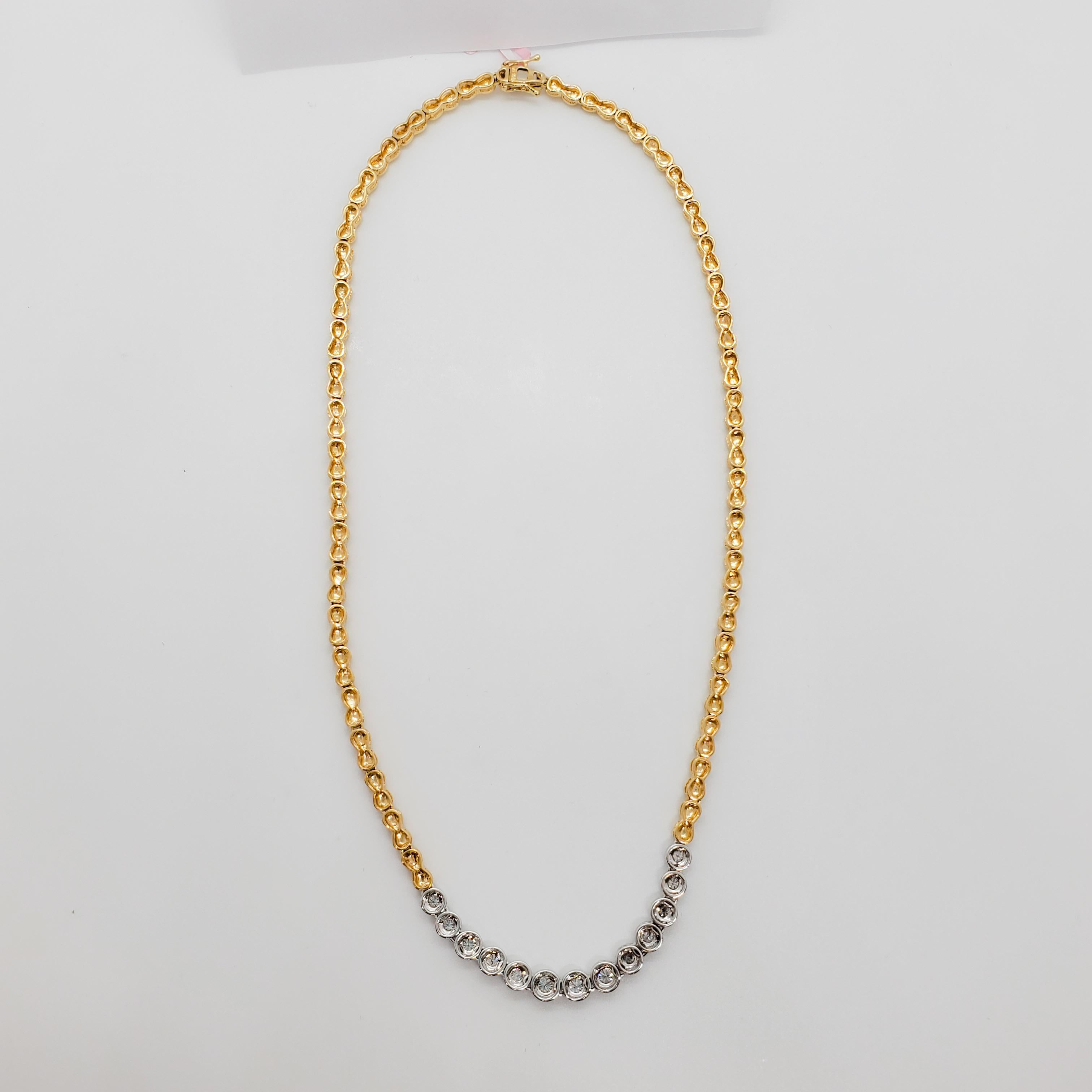 Beautiful and classic white diamond necklace with 1 carat of good quality, white, and bright diamonds in a 14k two tone gold handmade mounting.  Necklace has a 2 safety clasps and length of 17