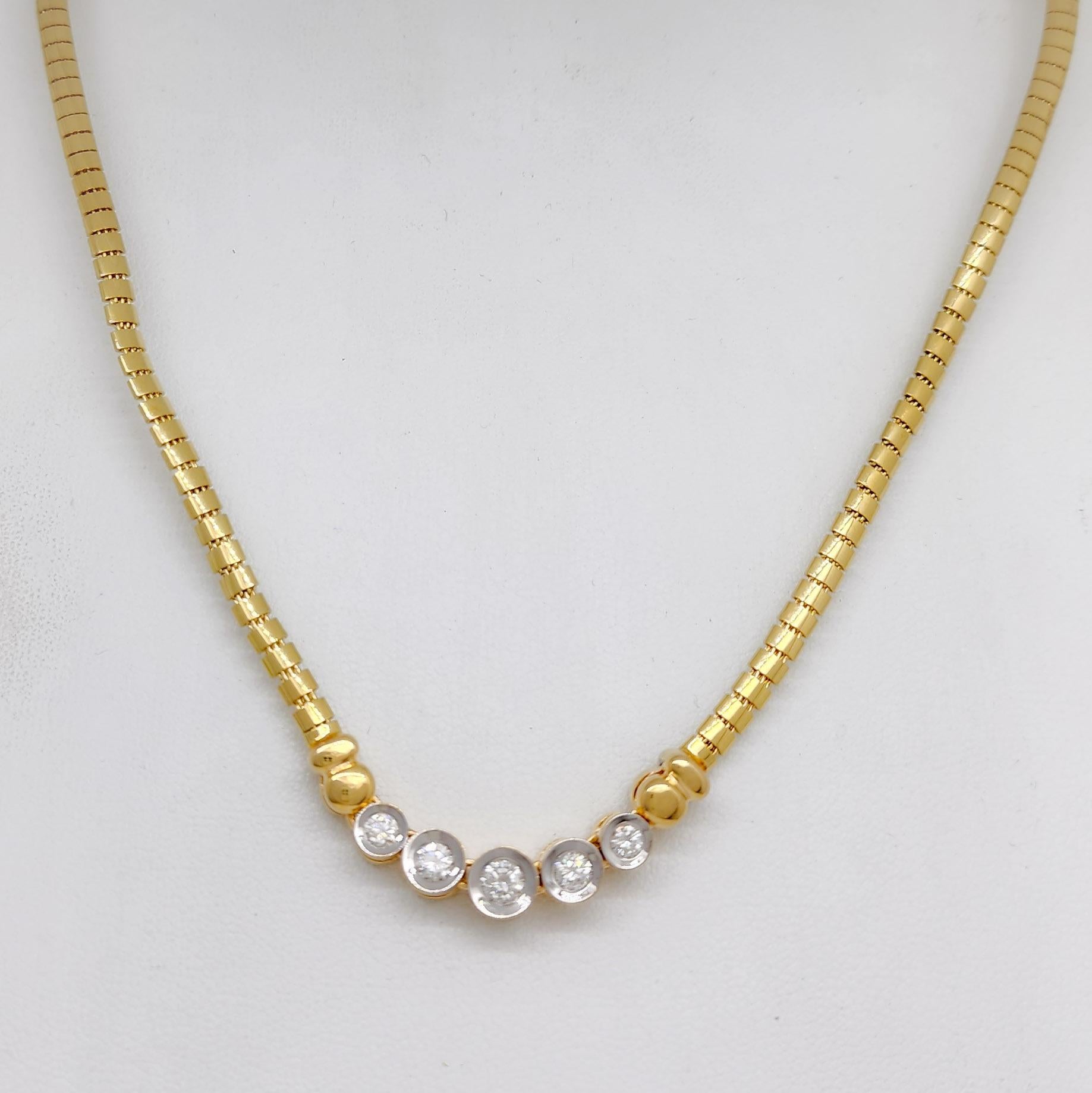 Beautiful 0.60 ct. white diamond rounds.  Handmade necklace with omega snake chain in 14k yellow gold.  Length is 18