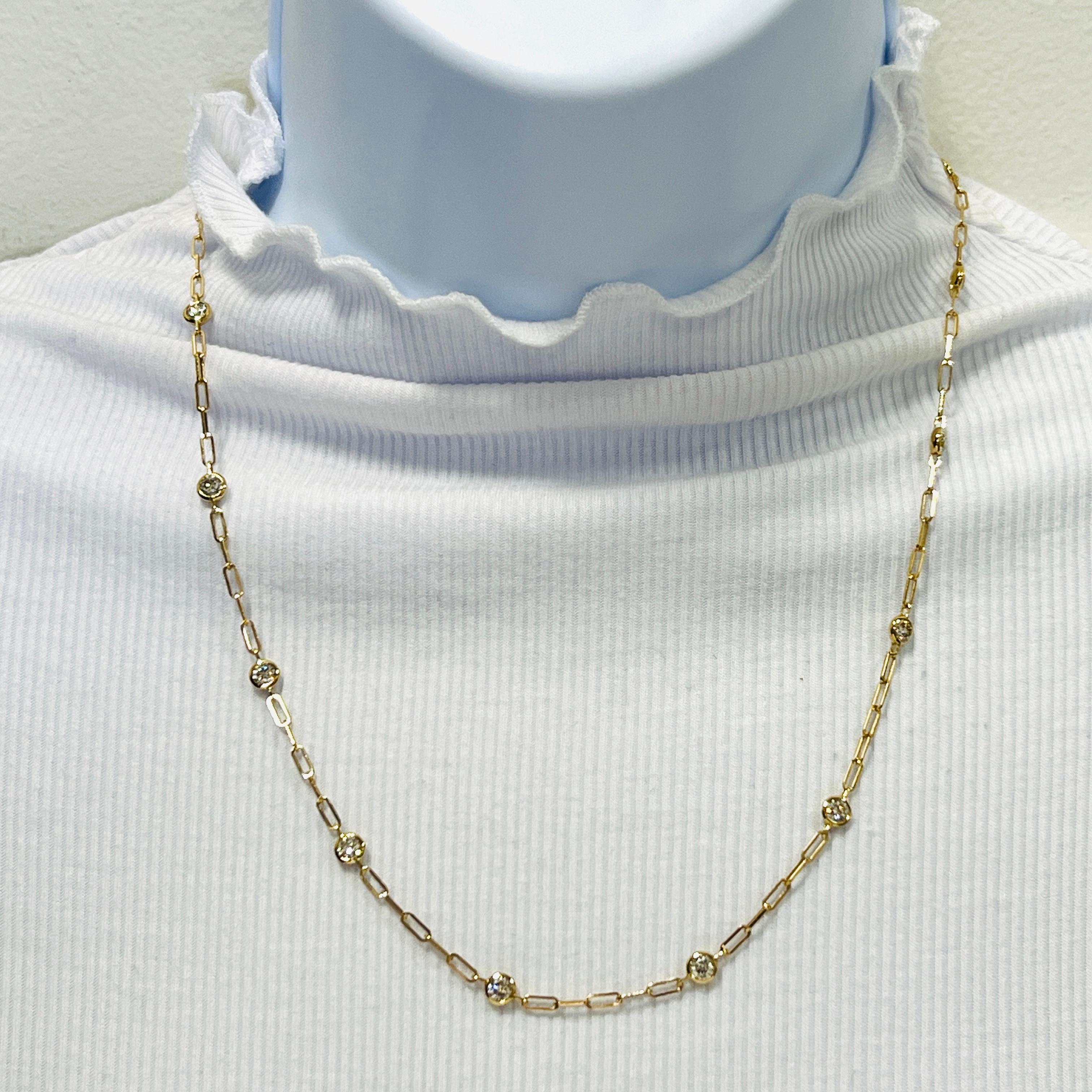 Beautiful 2.10 ct. good quality, white, and bright diamond rounds. Handmade in 14k yellow gold.  Total of 11 stones. A great classic piece that can be worn on it's own or stacked with other necklaces.  Length is 20
