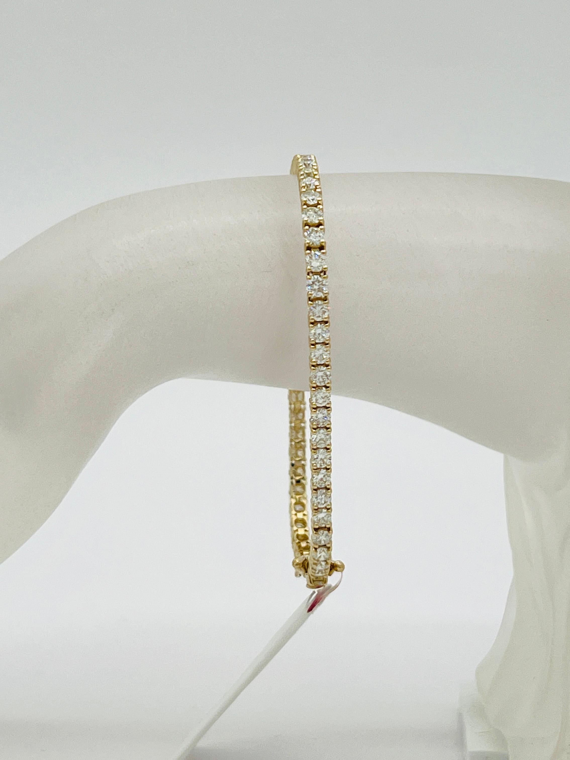 Beautiful 7.54 ct. good quality, white, and bright diamond rounds.  Total of 48 stones, each stone is 0.15 ct.  Length is 7