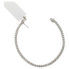 Bracelet de tennis rond en or blanc 18 carats avec diamants blancs