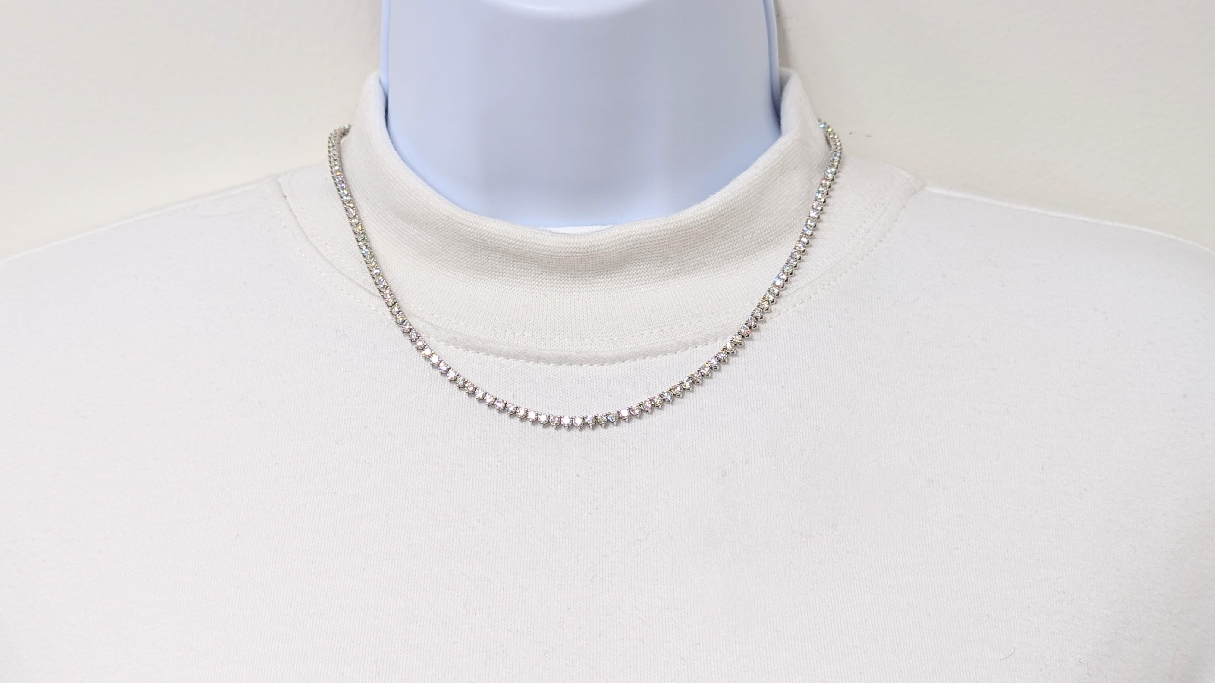 Beautiful 8.40 ct. white diamond rounds (total of 147 stones) in this 3 prong setting tennis necklace.  Handmade in 14k white gold.  Length is 15.5