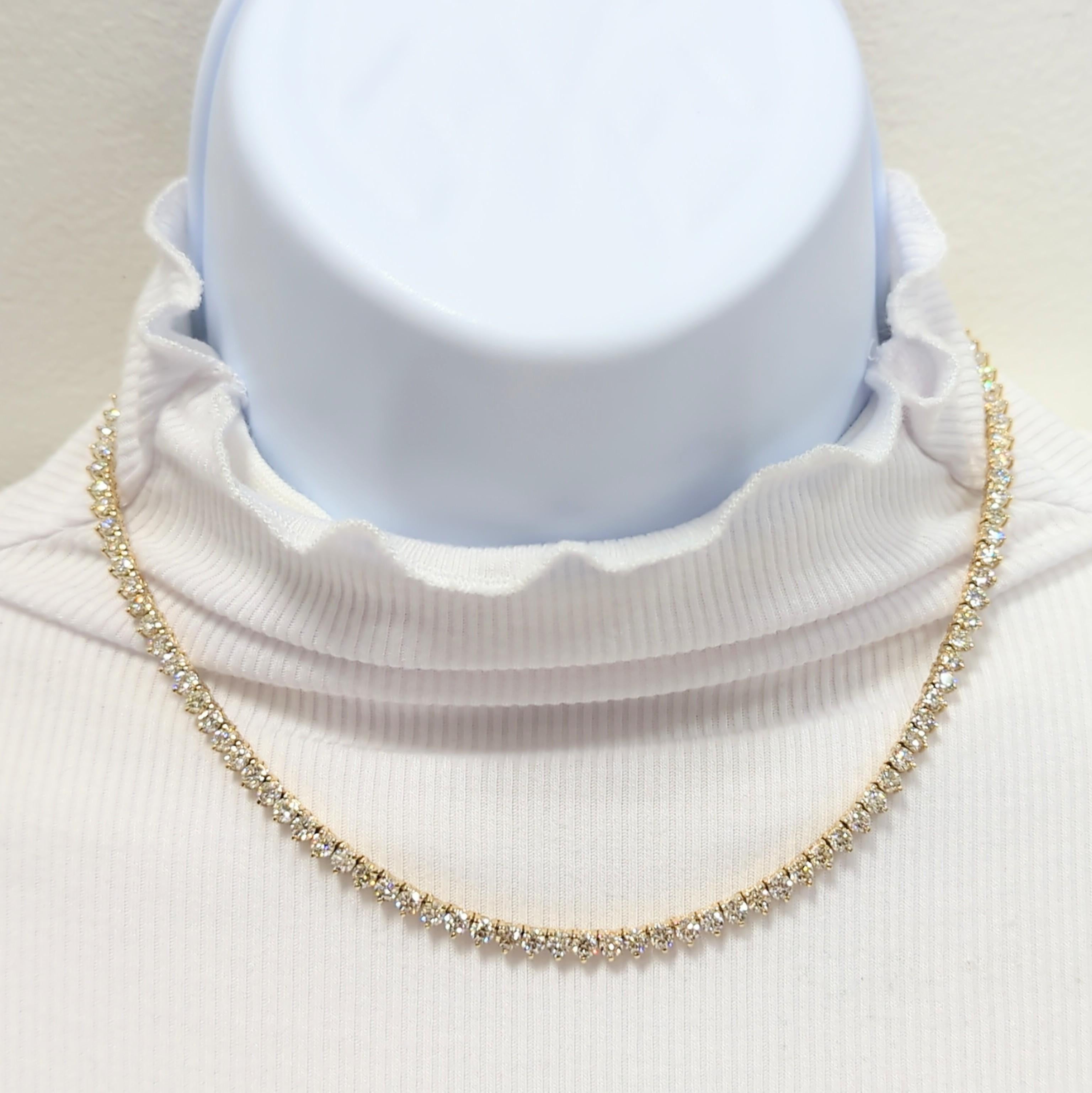 Beautiful 17.65 ct. white diamond rounds.  Handmade in 14k yellow gold.  Length of necklace is 16