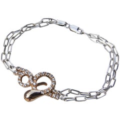 J Dauphin Bracelet serpent en argent, chaîne et pendentif en bronze avec diamants blancs et rubis